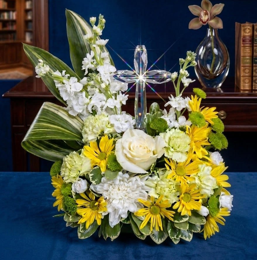 Heaven's Ray Crystal Cross - A unique gift for a family or person living with sorrow. This is the perfect gift to lighten their grief with bright yellow daises, white stock flower, a single white rose and green carnations. 