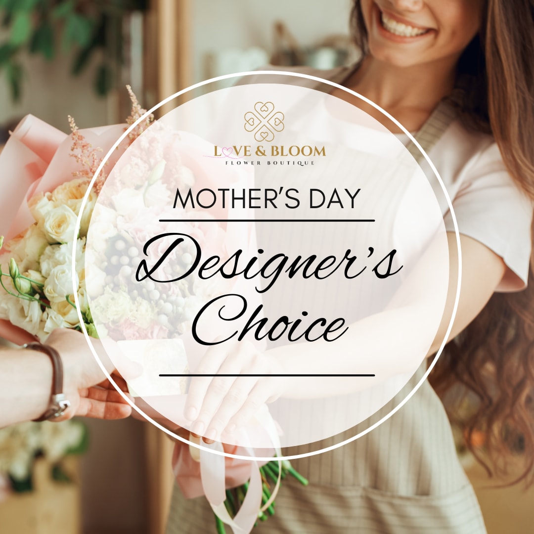 Woman holding a pastel bouquet with a Mother's Day sign