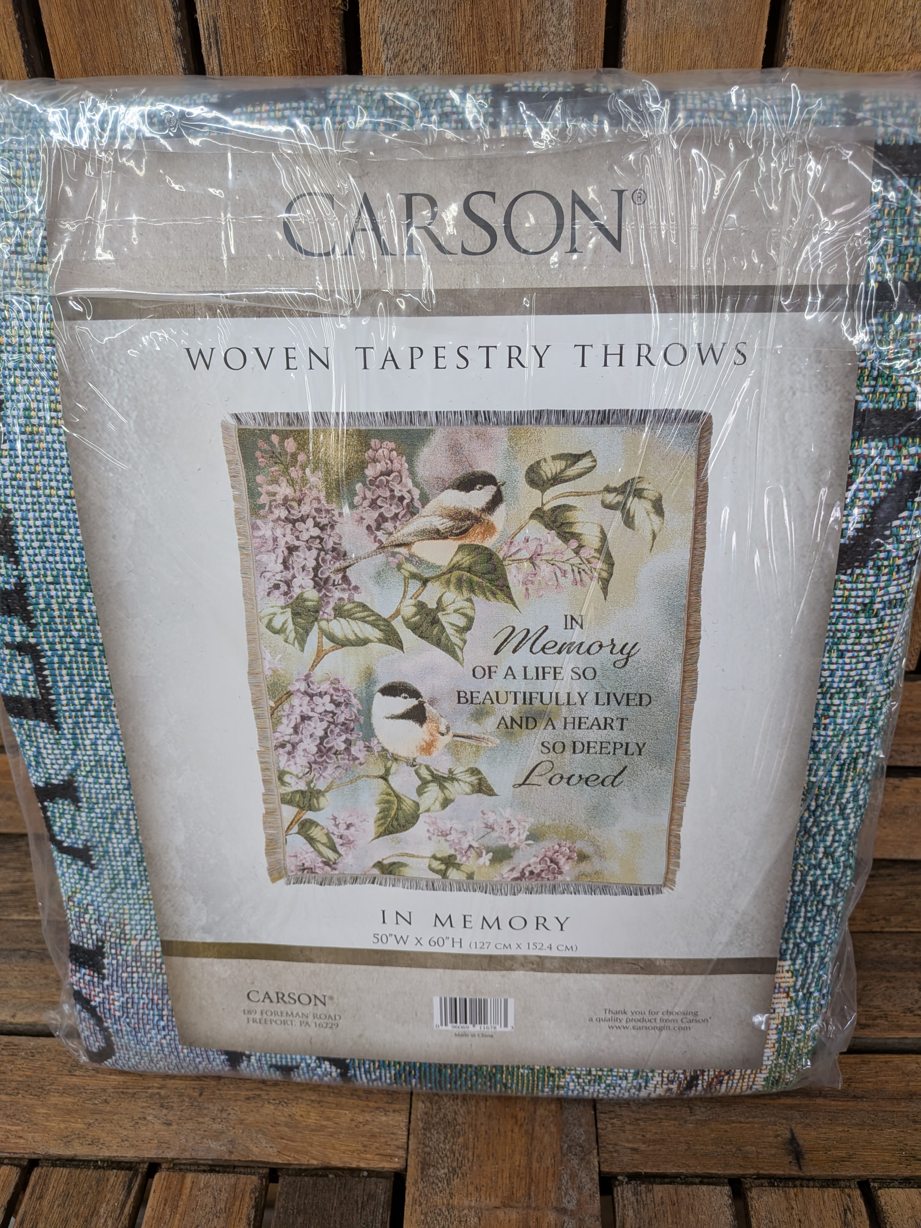 In Memory Throw - 50" by 60" Throw. Machine washable. Comes displayed on stand.