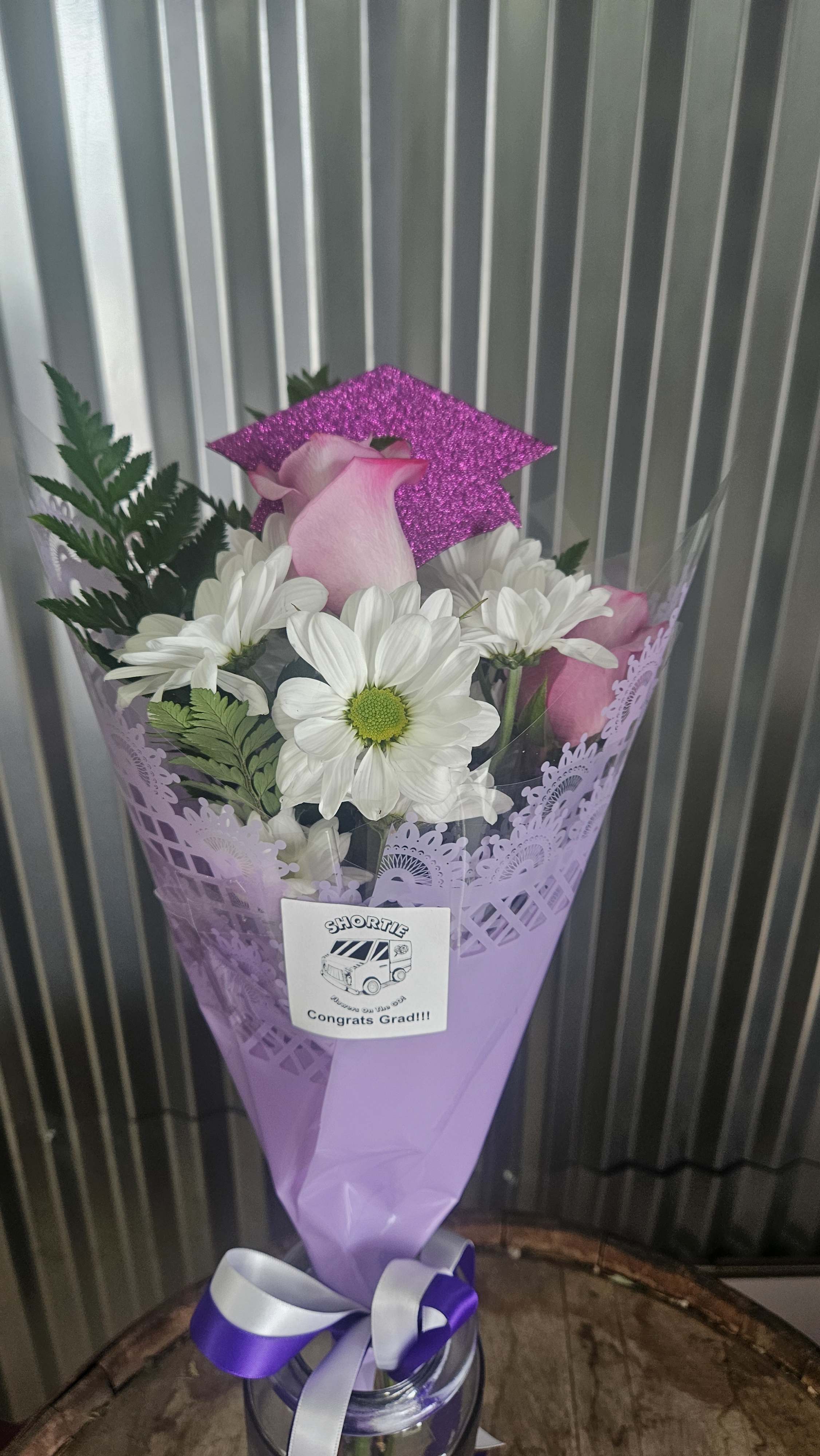 Grad Bouquet in Purple and White  - Congrats your grad with this simple bouquet of Roses and Mums in School Colors 
