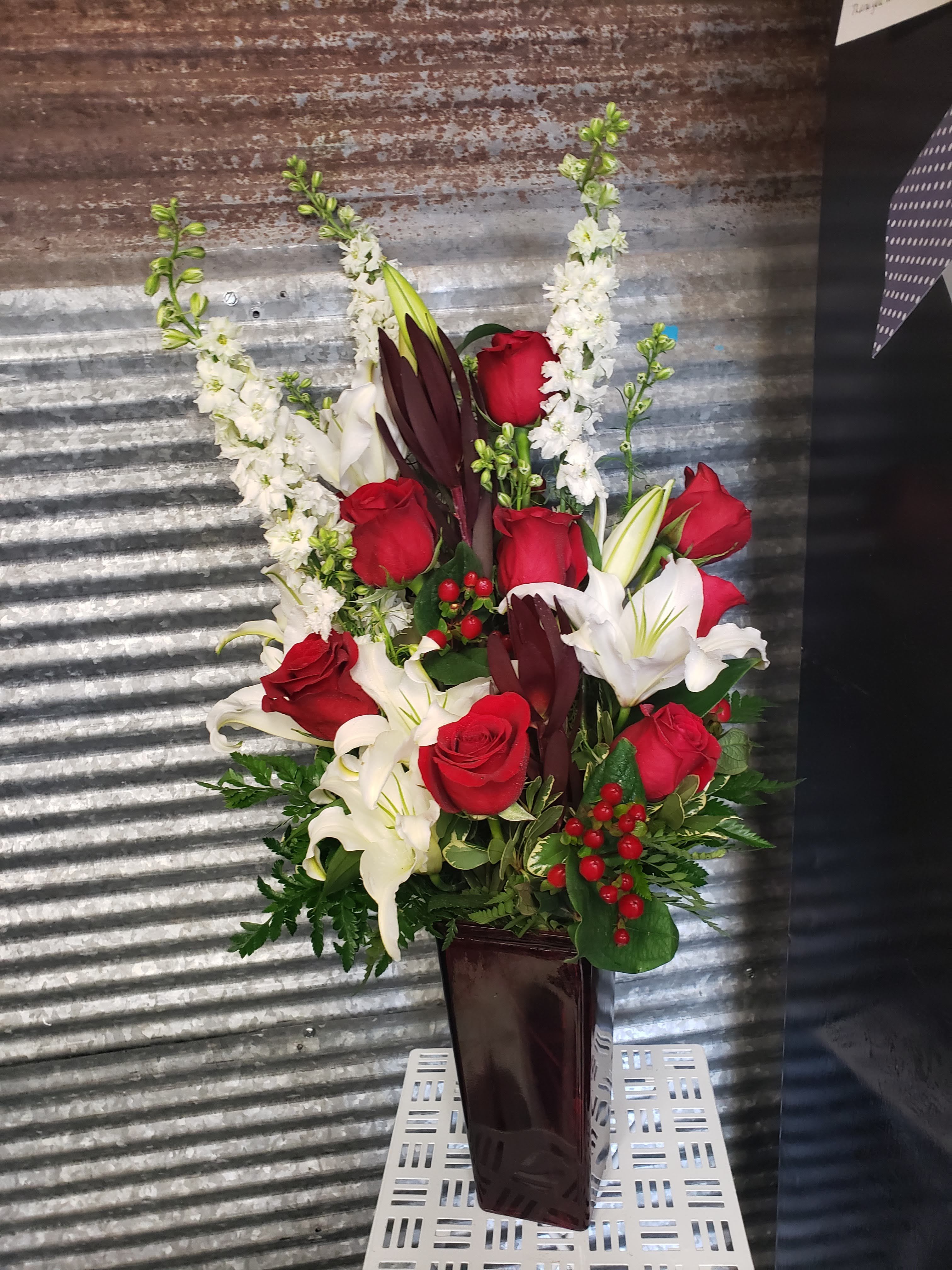 Red and White Square Tall vase arrangement  - A beautiful mix of Red and white flowers in a Red Tall Square vase for something a little bit different 