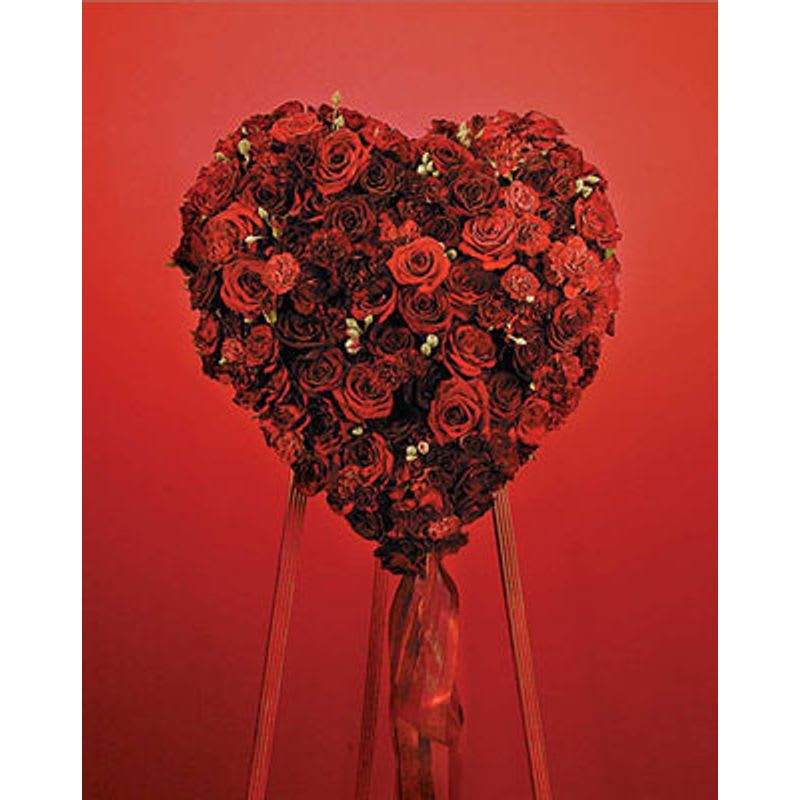 Red Heart Spray - The most beautiful and heartfelt tribute. All red roses and carnations.Can be designed in other colors. 