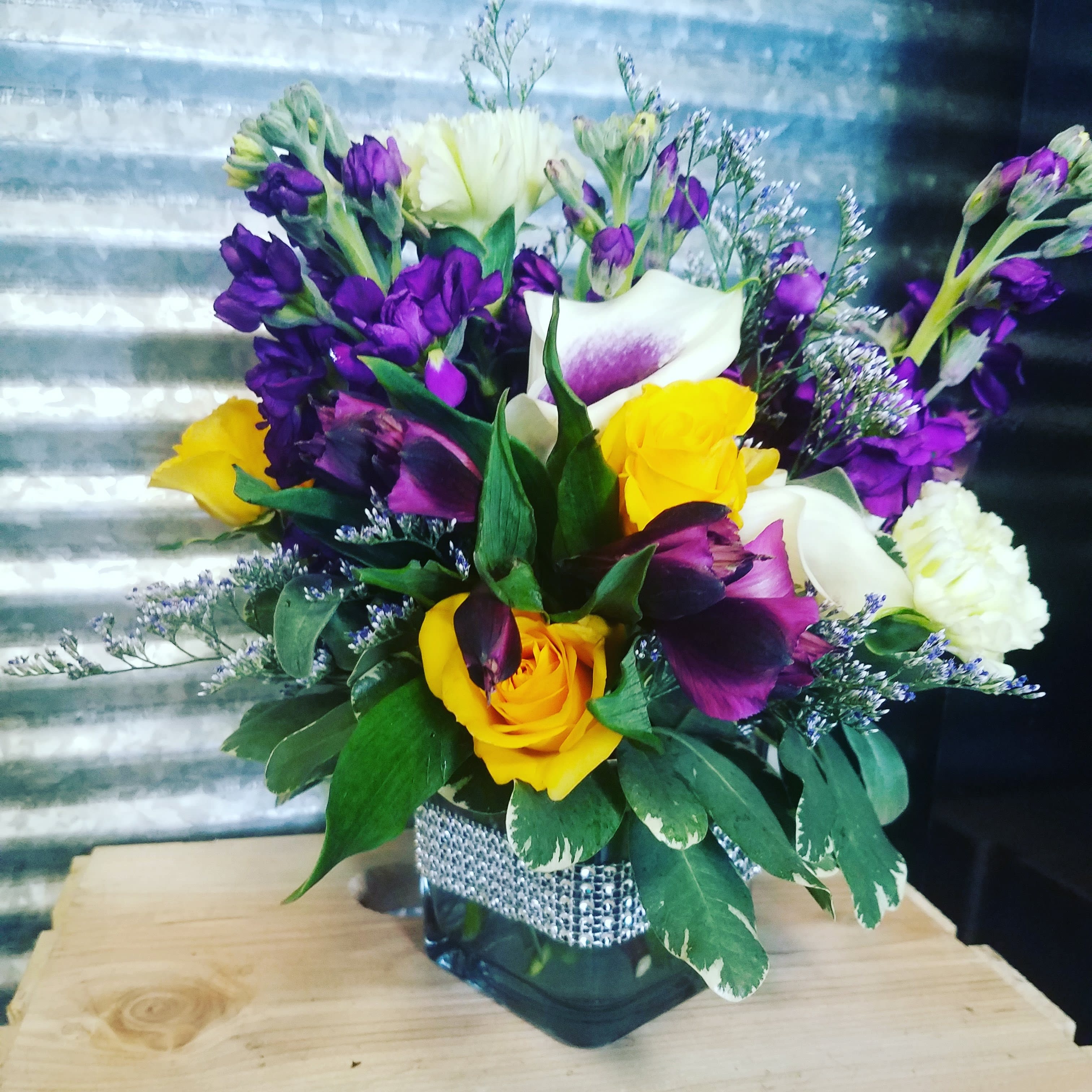 Purple Dreams by Purple Orchid flowers - A fragrant Cube arrangement with Bright beautiful purple flowers.   *** all Cube arrangement are short compact arrangements ****