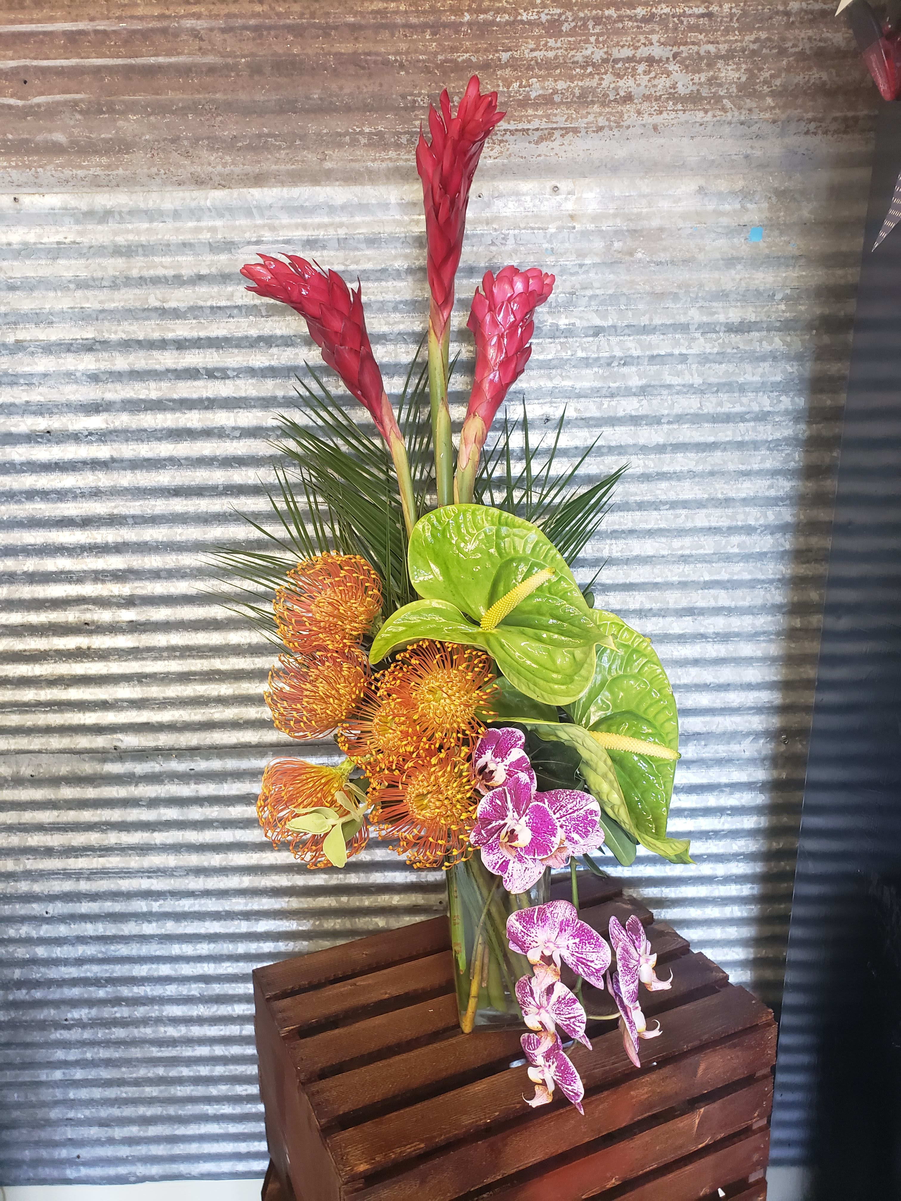 Tropical Fun Loving - You they love they Tropics. Send them this fun vase of Tropical flower