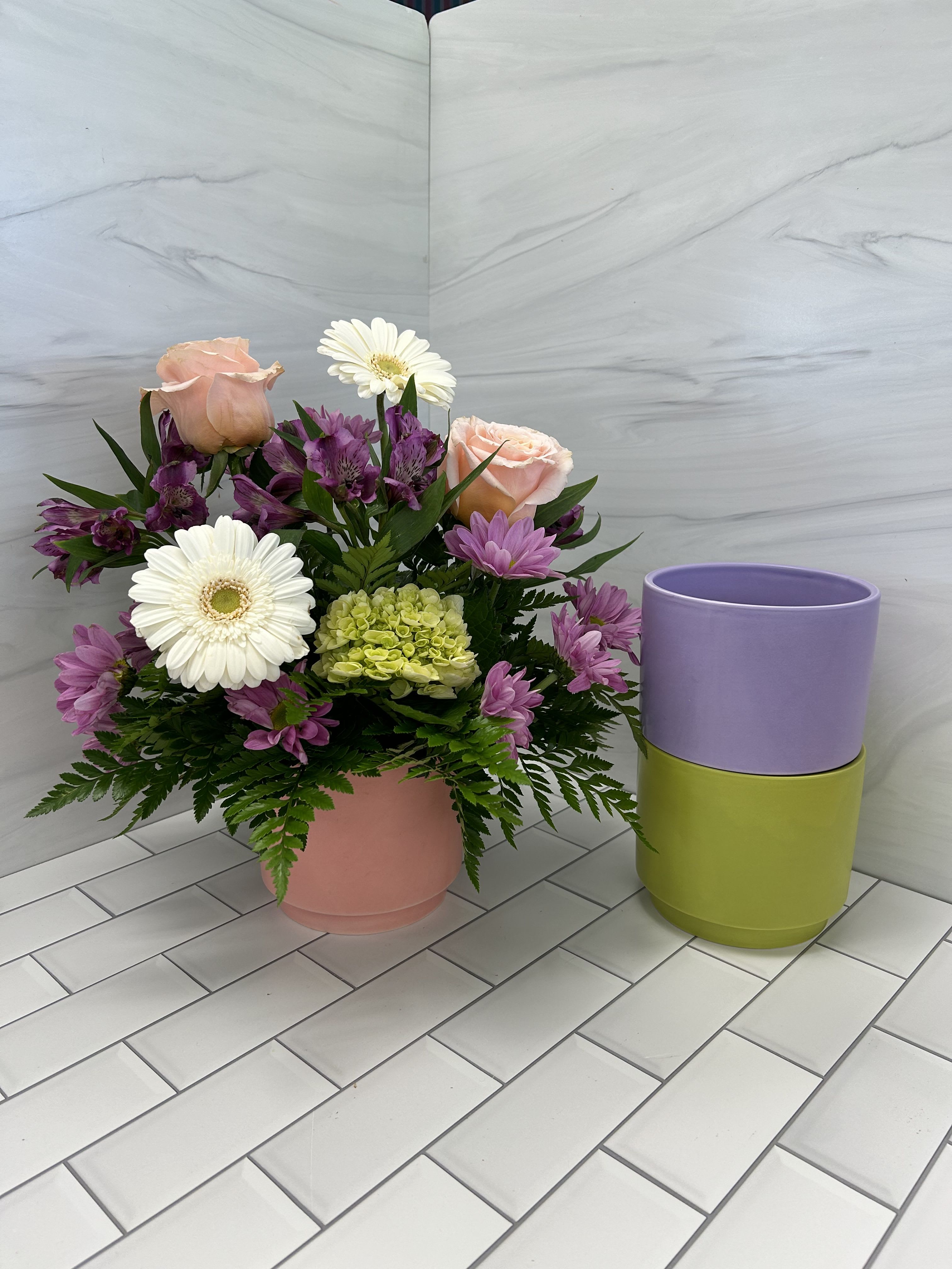 Love You Mom - Let mom know you love her with this sweet and simple arrangement.  This container arrangment features gerbera daisies, green hydrangea, roses, daisies and alstroemeria.  Container color may vary.  Bouquet will be delivered approximately as pictured.