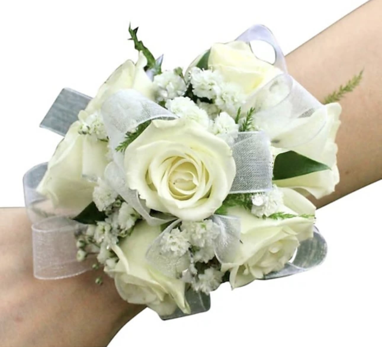 White rose wrist corsage with sheer ribbon and small white filler flowers