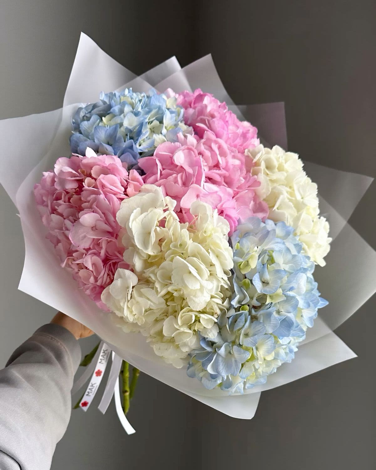 Mothers Day Pastel Hydrangea Bouquet-7 pieces - Beautiful Hydrangea arrangement featuring mixed seasonal colors based on store availability. Each design is carefully created using the freshest blooms in stock, ensuring the same value, fullness, and quality. Soft and elegant floral gift, perfect for any occasion including mothers day, Easter, birthdays, celebrations, or home décor.