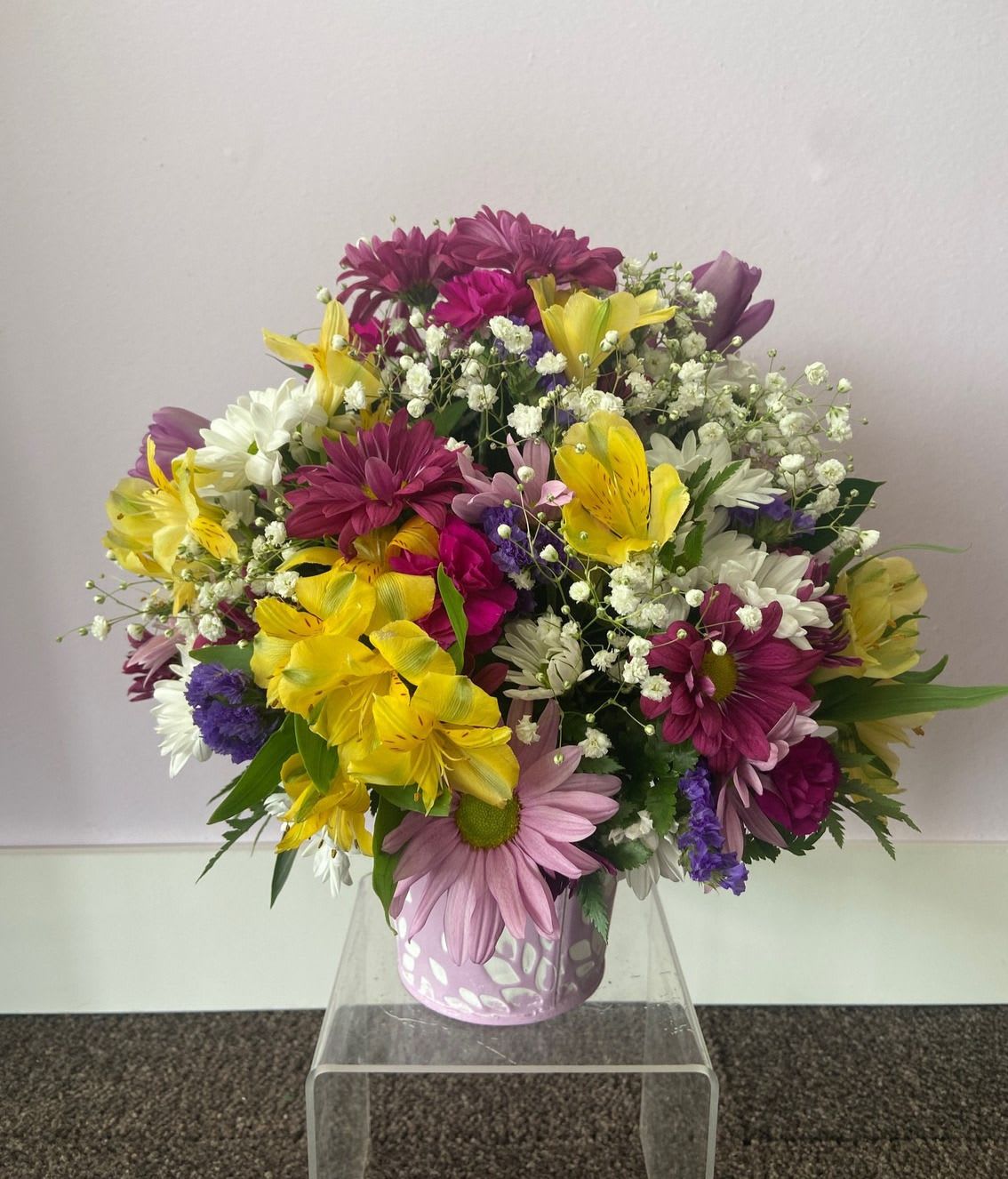 Pastel Petal Pail - This beautiful pastel pail is full of lovely spring blooms, any mother would love to get this wonderful arrangement.