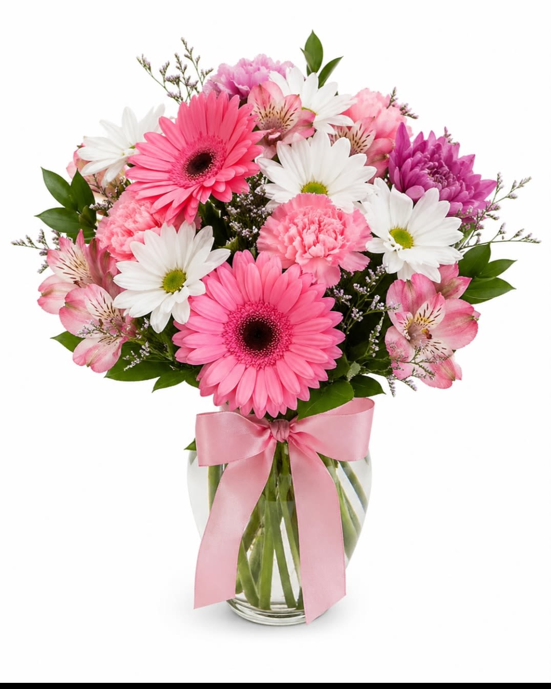 Pink Petal Delight - A cheerful every day bouquet featuring vibrant pink grbera daisies, lavender mums,and delicate alstromeria accented with fresh greenery.Designed in a clear glass vase and finished with a satin bow.