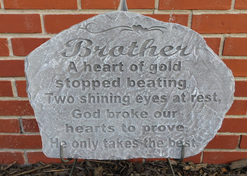 Engraved memorial stone with the word Brother and a poem