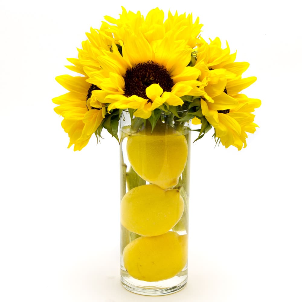 Lemonade - Clear glass container with lemons and sunflowers. Great for fun and sun any day of the year! 