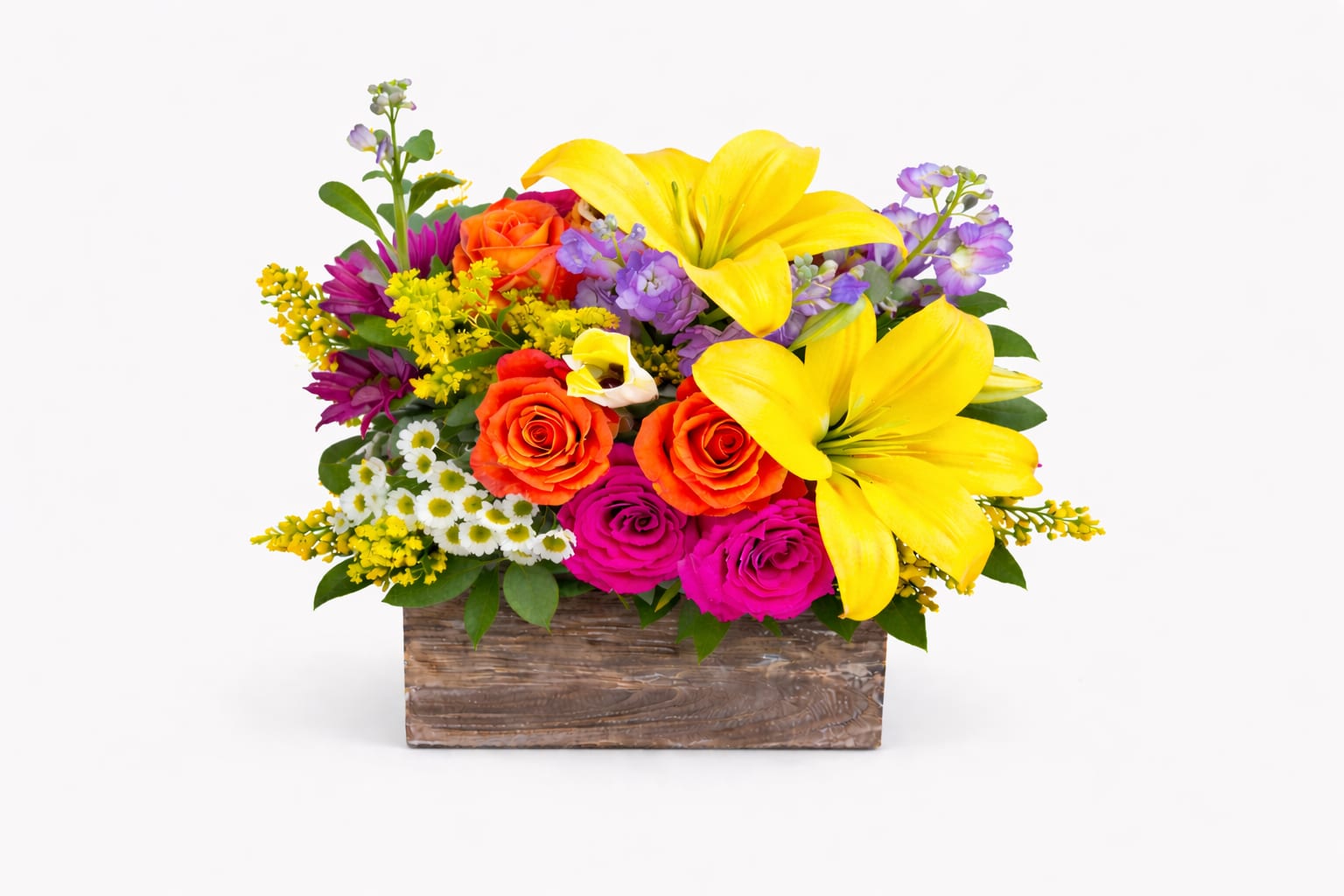 Garden Delight | Designer Choice - A joyful, florist-designed flower arrangement featuring a vibrant mix of seasonal blooms in fresh, uplifting colors. Thoughtfully created to express warmth, gratitude, and love, this design brings brightness and happiness to any space.  Each arrangement is Designer’s Choice, carefully created with fresh seasonal blooms. Flower varieties, color tones, and vase may vary based on availability while preserving the overall size, style, and quality.  Perfect for Mother’s Day, spring celebrations, birthdays, get well wishes, thank you gestures, or sending a cheerful “just because” surprise to brighten someone’s day.  Same day flower delivery available in Southwest Florida, including Naples, Bonita Springs, and Fort Myers Beach.