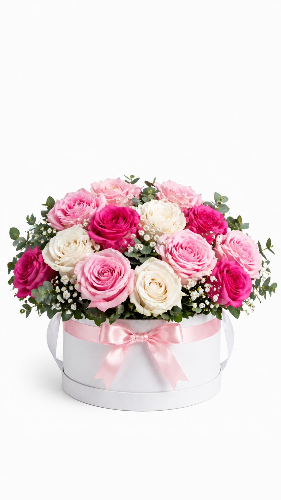 Blush &amp; Pink Rose Hat Box – Short  - A refined and elegant floral design featuring a curated mix of hot pink, blush pink, and classic white roses, beautifully arranged in a modern white hat box and finished with a soft satin ribbon.  Designed in a low, compact style, this arrangement highlights the natural beauty of each rose with soft texture and a balanced, polished presentation. Accented with delicate baby’s breath and fresh greenery, it creates a romantic look that feels both modern and timeless.  Better for: Mother’s Day, birthdays, thank you, get well, or a thoughtful everyday gesture.  Arrangement will be delivered approximately as shown. Flower varieties and color tones may vary based on seasonal availability. Any necessary substitutions will be made at the florist’s discretion while maintaining the overall look and feel of the design.