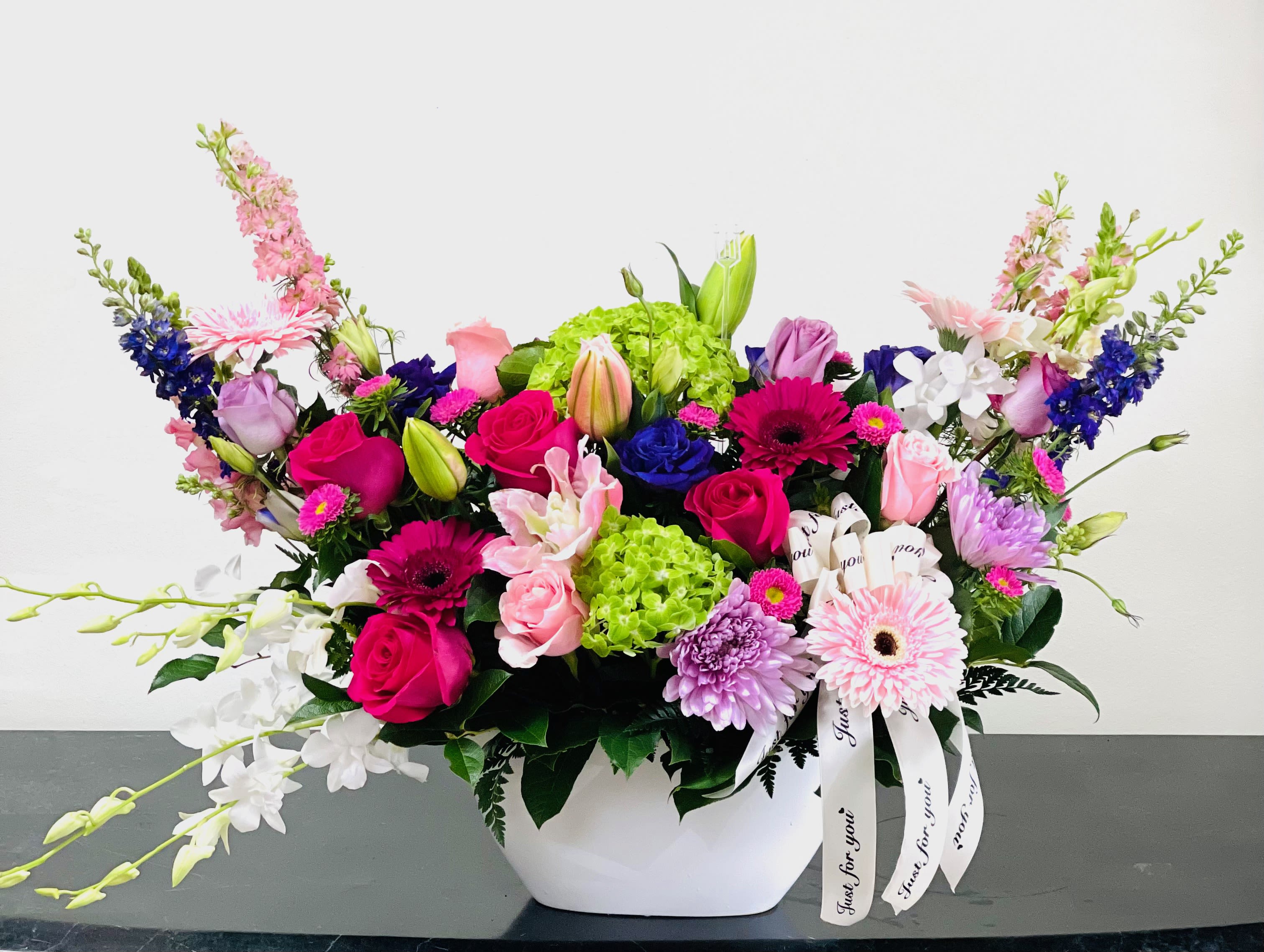 BF-M15 Mother's Day Spring Serenade - Celebrate Mom's special day with our enchanting Mother's Day Spring Mix, elegantly arranged.