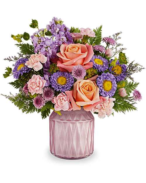 Teleflora's Forever Enchanting Bouquet - Make every moment feel magical with Teleflora's Forever Enchanting Bouquet, a vibrant mix of peach, pink, and lavender blooms arranged in Teleflora's Dazzling Gem Jar. The pearlescent geometric finish adds lasting sparkle and charm.