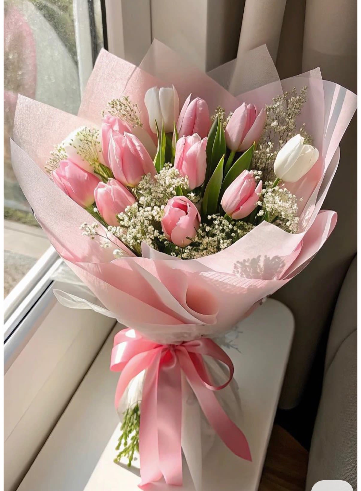 pink tulips - A pink tulip is a soft and graceful bloom that symbolizes affection, happiness, and gentle admiration. With its smooth petals and delicate color, it brings a fresh, uplifting feel—perfect for expressing sweet, heartfelt senti