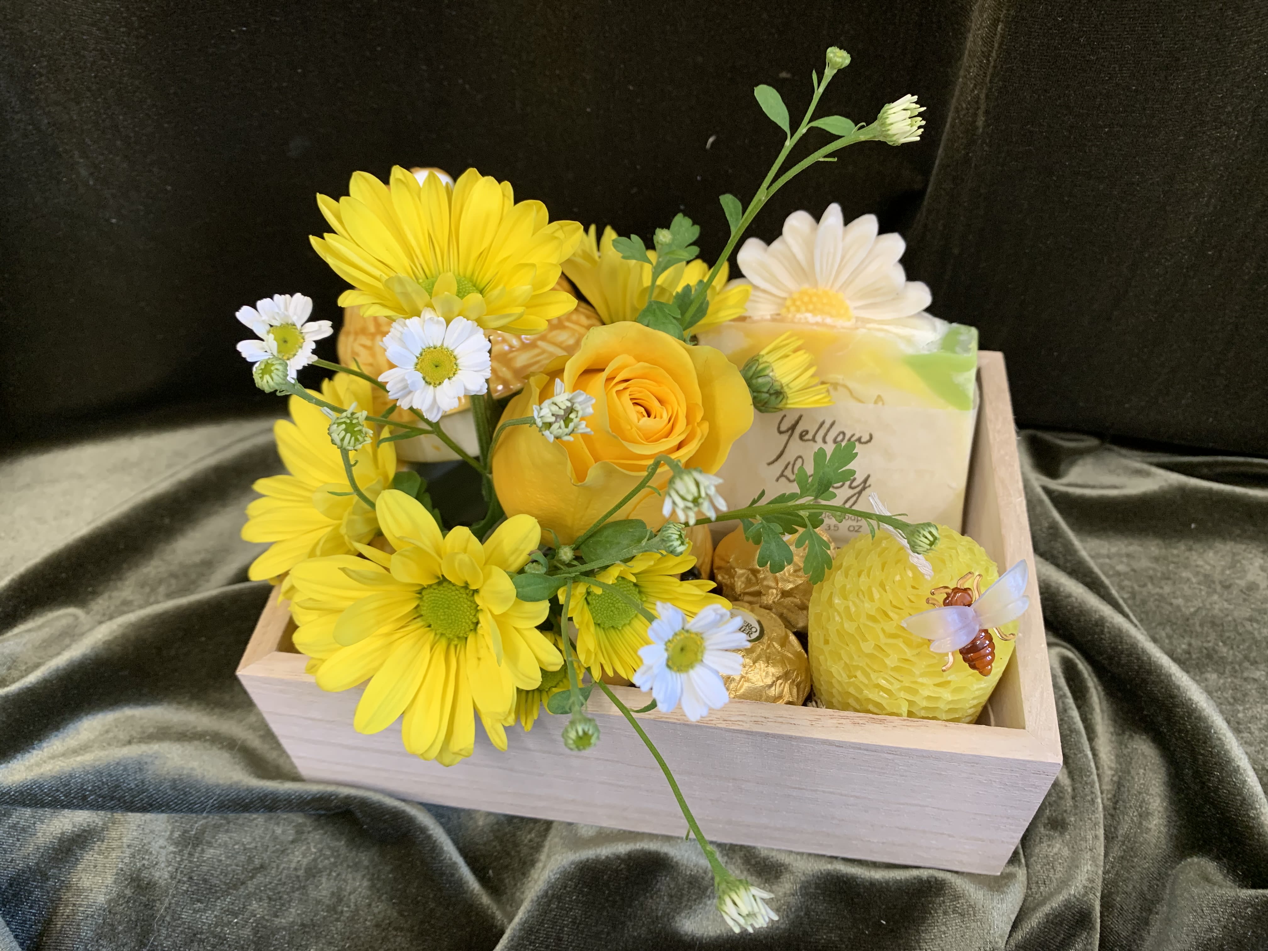 The Bee Box - A delightful gift using a honey pot flower arrangement with cheerful sunflowers, a small honey bee candle and a daisy shaped bar soap! 