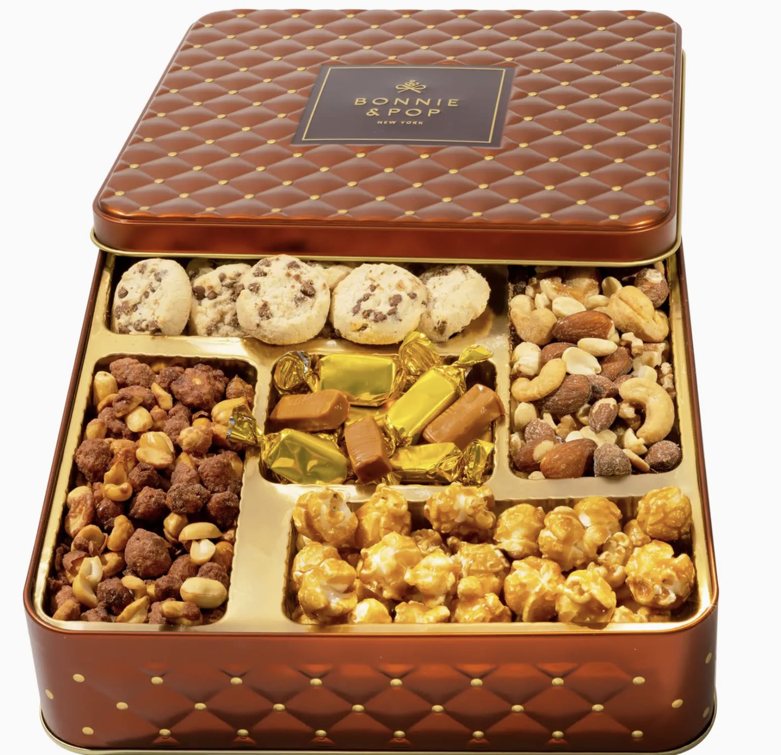 Caramel and Nuts Gourmet  - This stylish gift delivers a thoughtfully curated mix of butter toffee peanuts, salted mixed nuts, foiled caramels, cookie crisps, and caramel popcorn. Presented in a chic square keepsake tin, it’s a tasteful, ready-to-give present for any occasion
