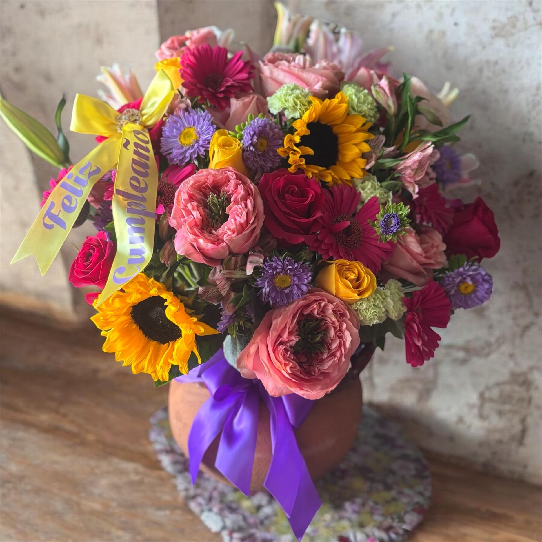 La Ollita Querida - roses are colorful roses with depending on availability on flowers 