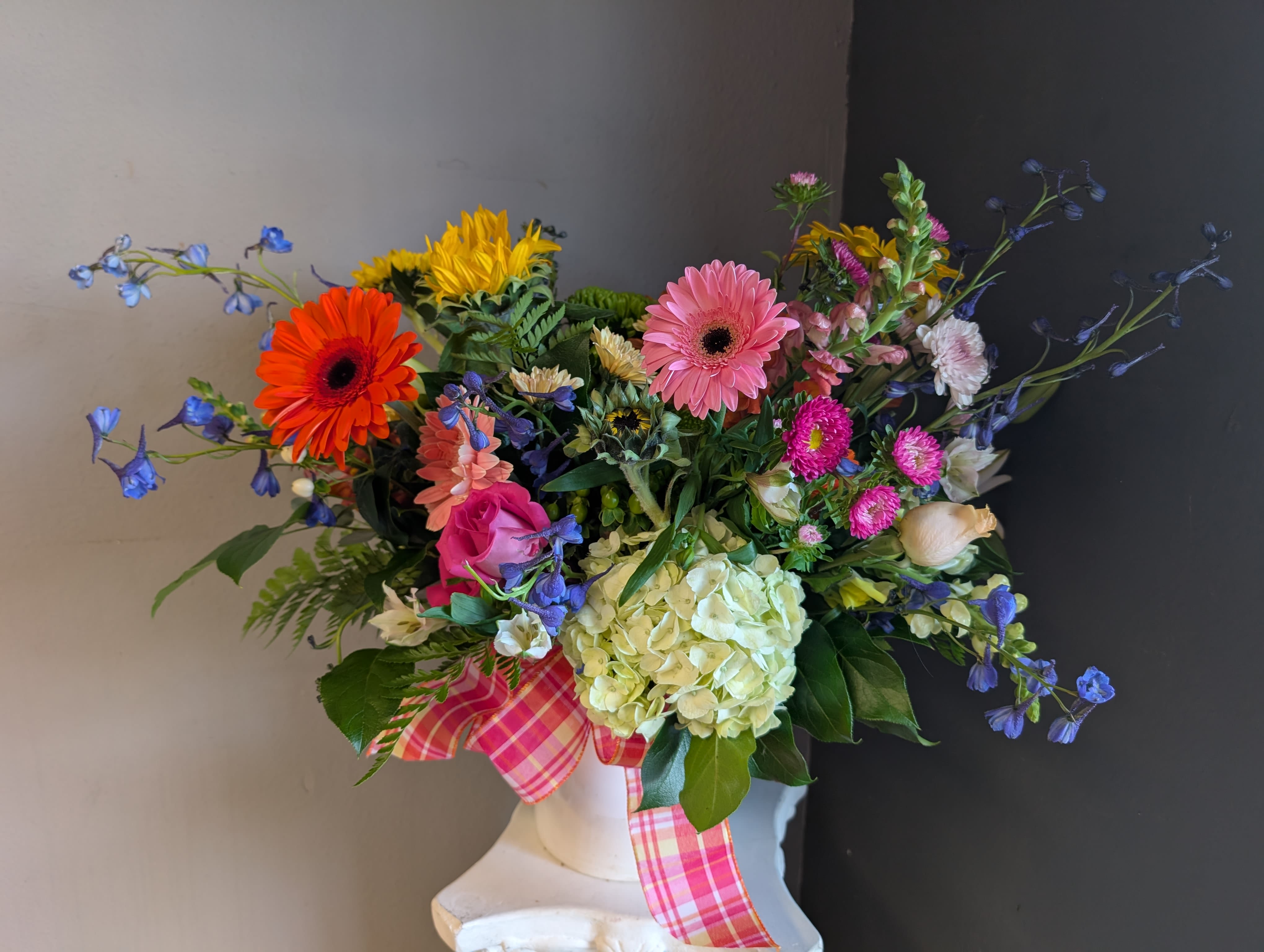 #742 Designers choice vase arrangement  - Hey beautiful seasonal mix with all your favorite flowers and colors. This medium size heavily flowered Arrangement is sure to bring some Joy to the recipient.