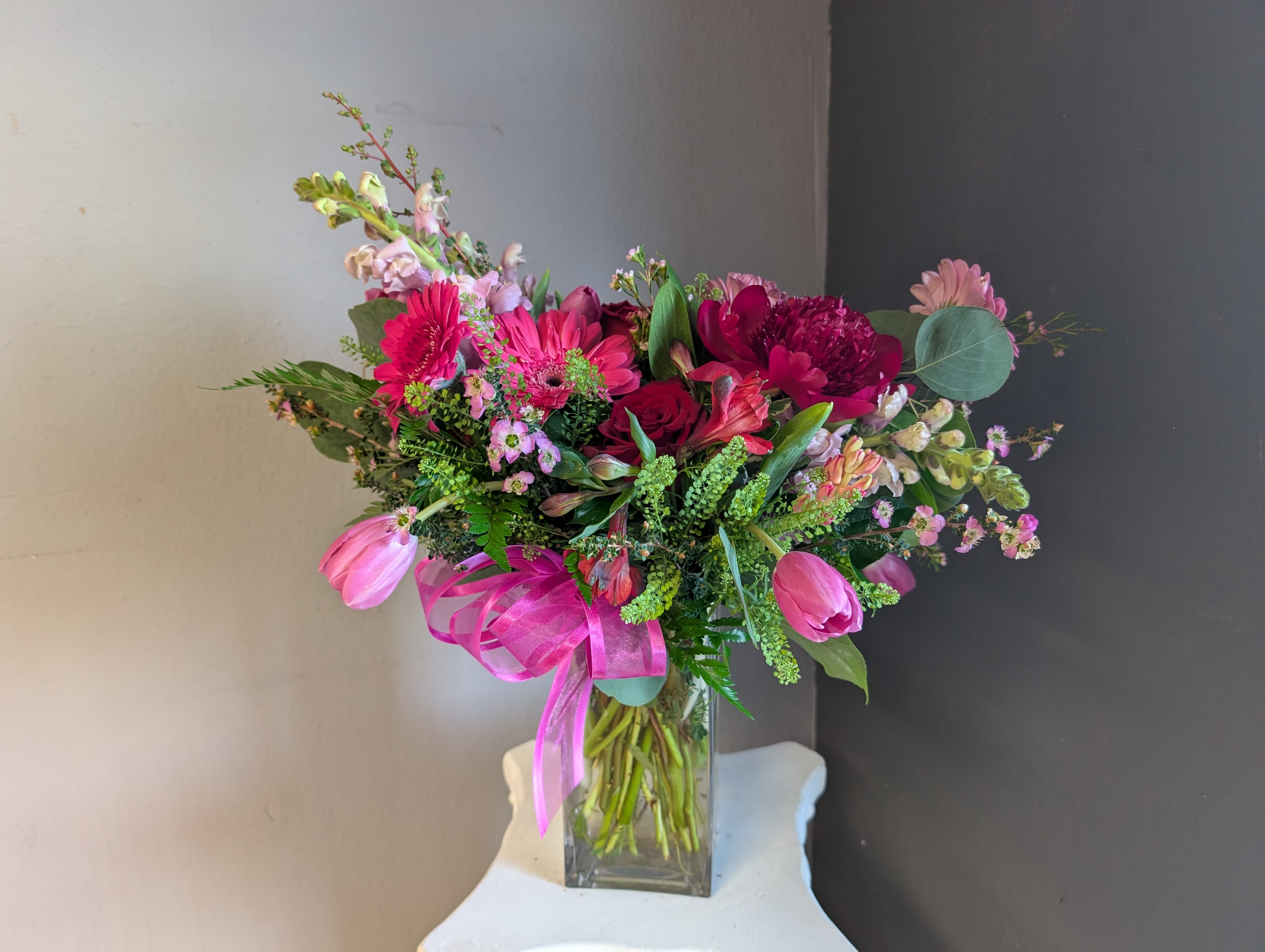 #725 Designer choice floral arrangement  - This beautiful flower arrangement of fresh mixed seasonal blooms is made by local designers in the heart Orange California. Hand crafted and perfect for every occasion, from birthdays and new babies to sympathy and just because. The best choice to show you are thinking of that special someone. Can be sent as a local delivery or in-store pickup. This is an original, one of a kind arrangement. Order now before it's too late!