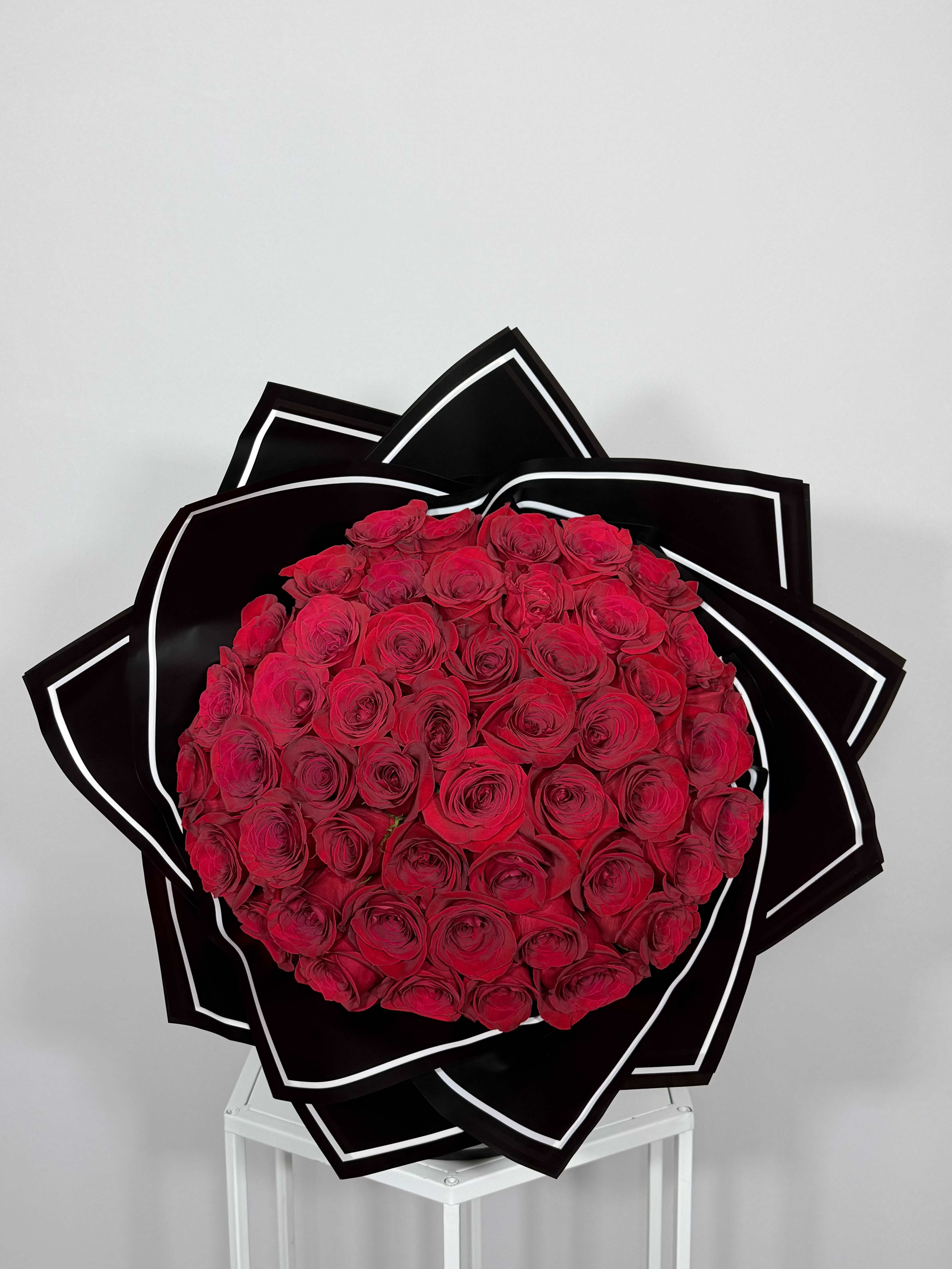 Midnight Love Bouquet - Natural Red roses wrapped in black paper with a white edge. Made to stand out and impossible to ignore. 