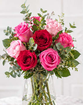 Mixing Pink Roses - Sweep them off their feet with a gorgeous blend of pink, hot pink and red roses