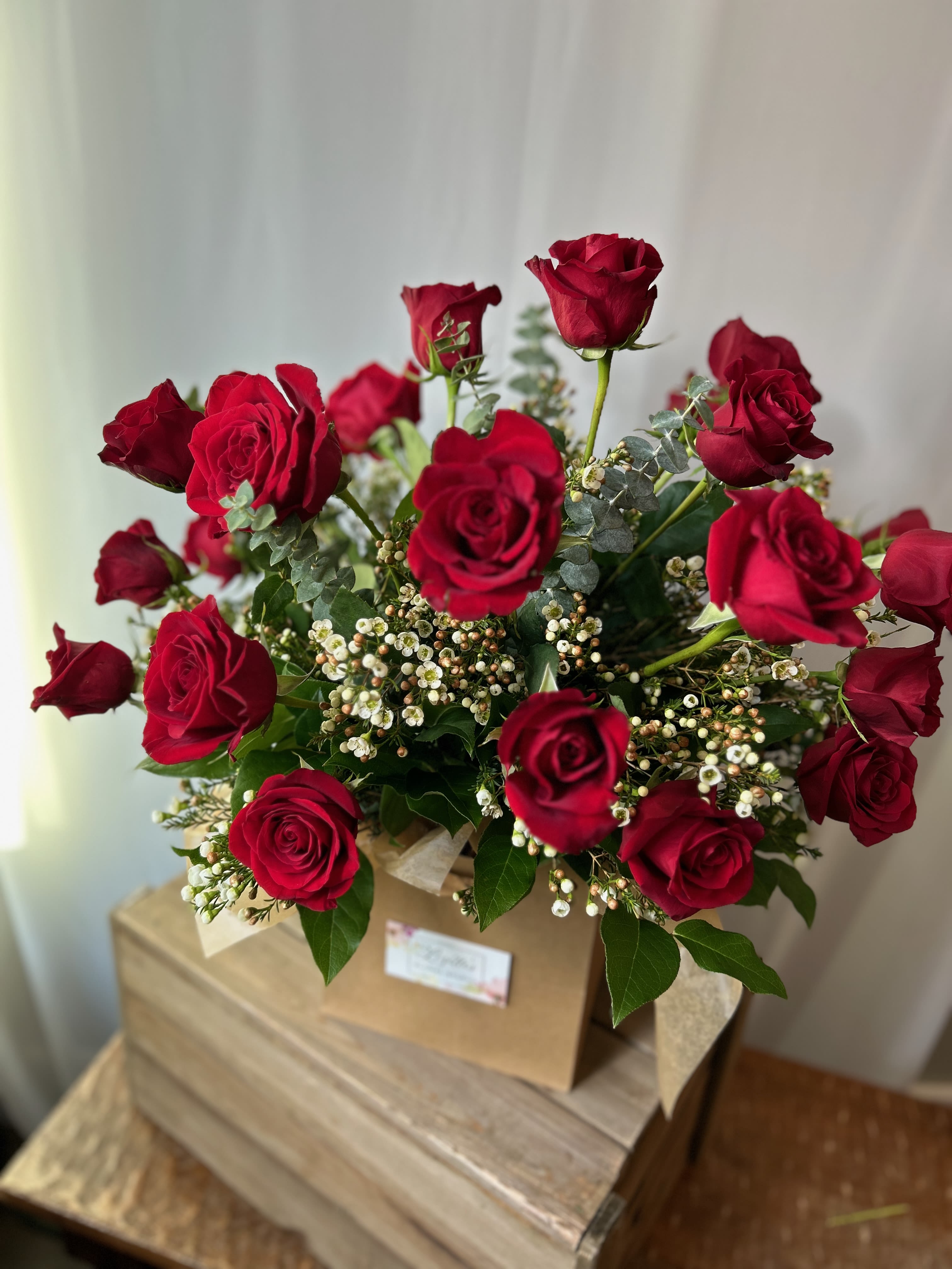 Signature Roses in a Vase - Classic roses beautifully arranged in a vase, perfect for birthdays, anniversaries, romance, sympathy, or simply because. Available in a dozen, 18, two dozen, or three dozen roses for a timeless gift that always makes an impression.