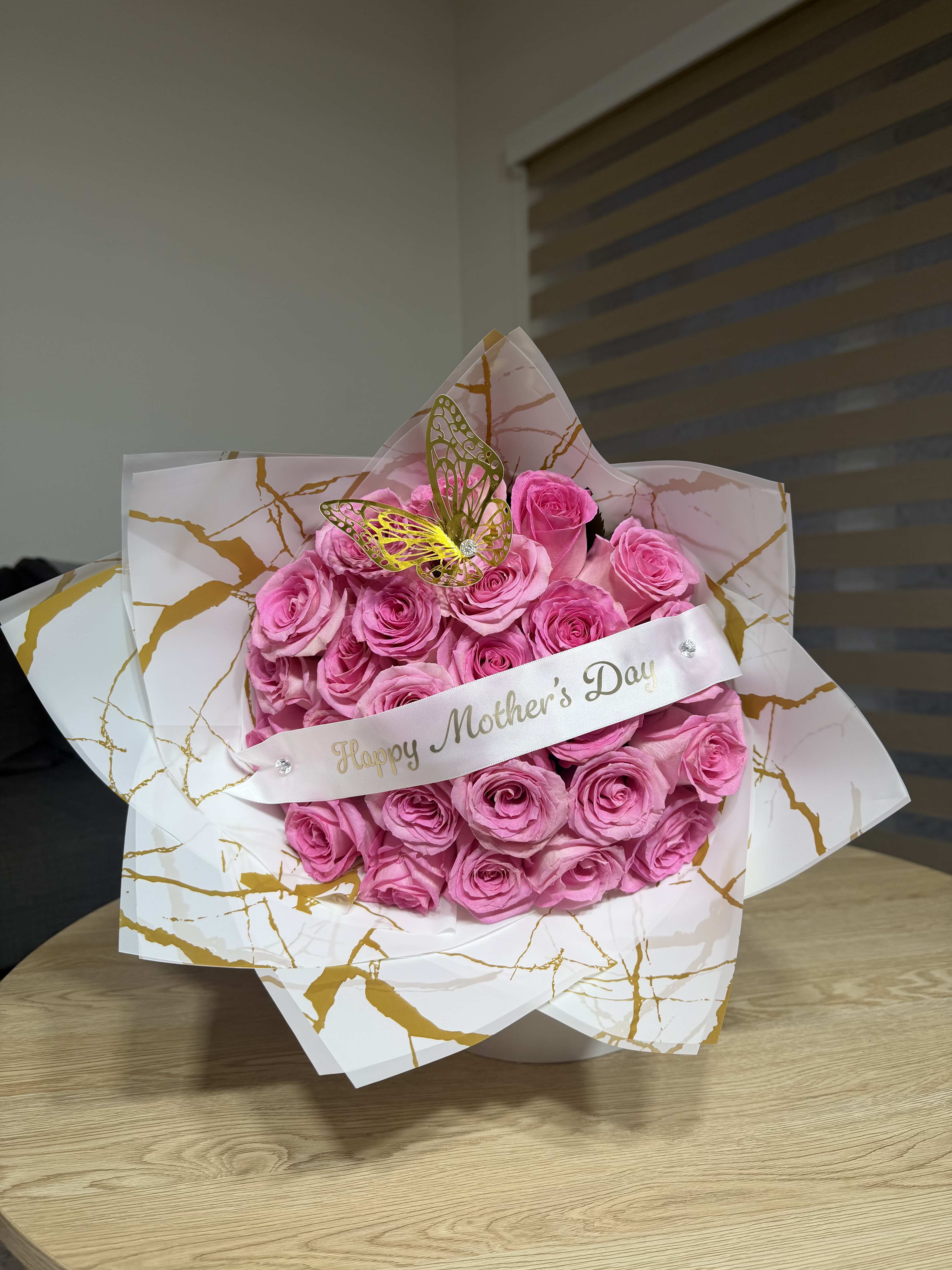 Victoria  - A beautiful and elegant bouquet of natural pink roses, designed for a mother who deserves something truly special. Soft, graceful, and full of love in every detail. 