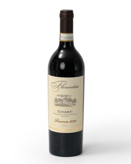 Bottle of Florentia Chianti Riserva 2019 red wine with cream label on a white background