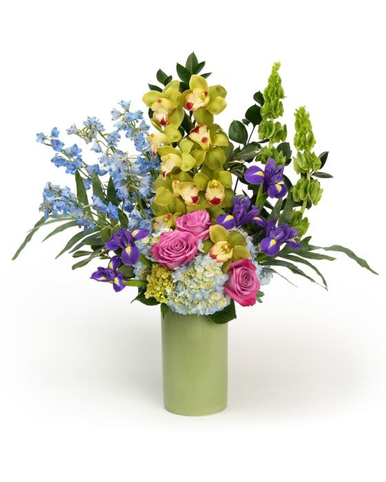 Blue Garden Harmony - A stunning arrangement with vibrant blue blooms and fresh greens with soft floral accents, designed with texture and a natural garden feel