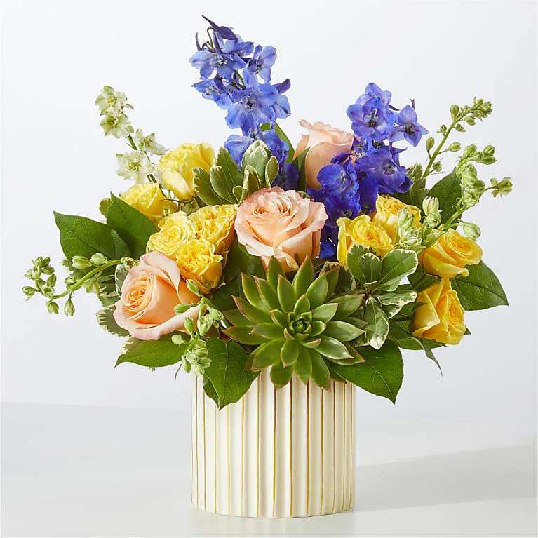 Cobalt Reverie Bouquet - Cobalt Reverie Bouquet Get swept away by this daydream of a bouquet, arranged with peachy roses, white mini carnations and striking blue delphinium.