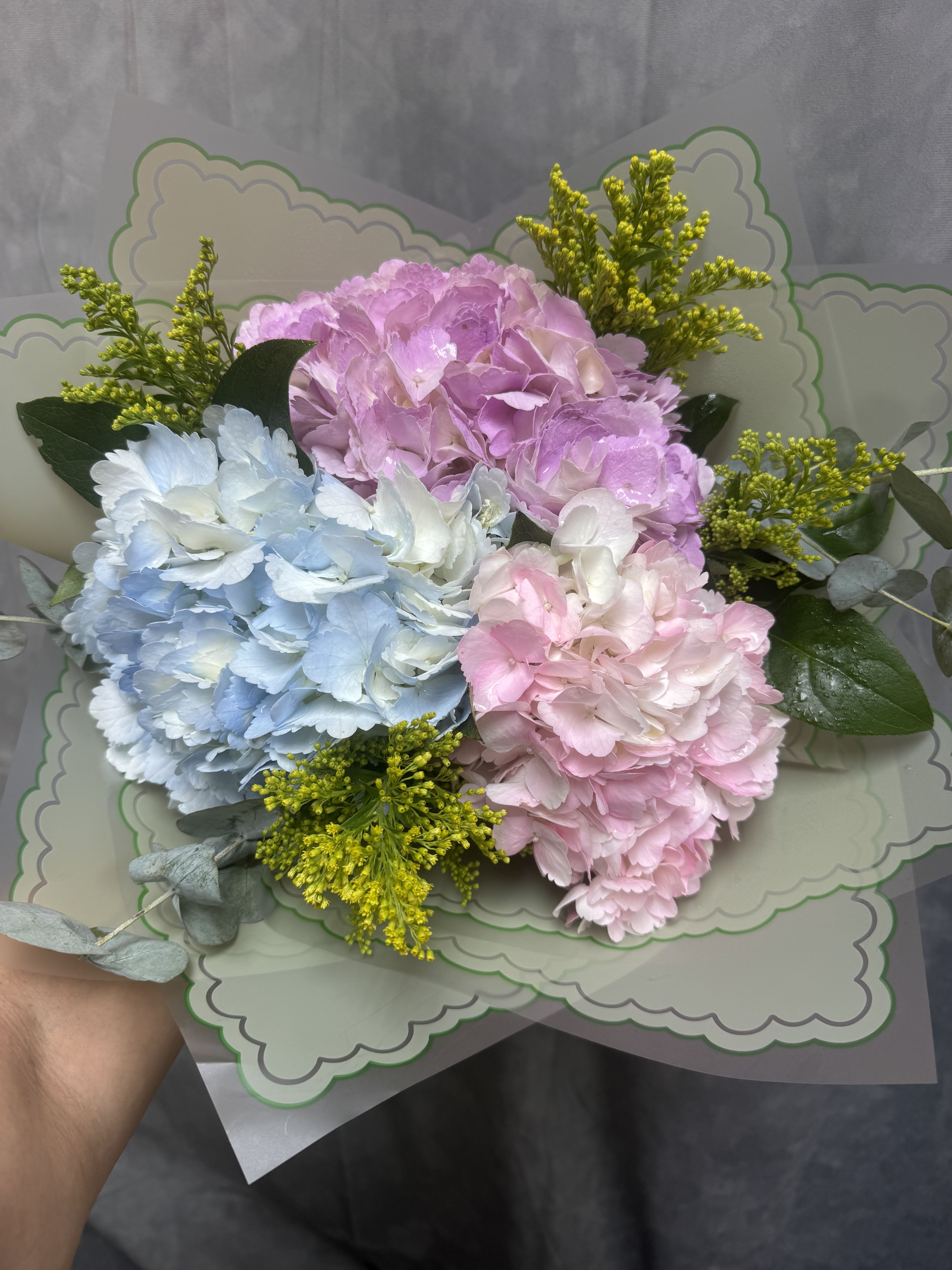 Hydrangea Lovers Bouquet  -  Hydrangea Lovers Bouquet  A timeless favorite for those who adore the charm of hydrangeas! This lush bouquet is filled with a gorgeous mix of fresh hydrangeas, accented with delicate fillers and rich greenery. Elegant, full, and romantic — it’s the perfect choice for celebrating special moments or simply indulging in the beauty of hydrangeas.