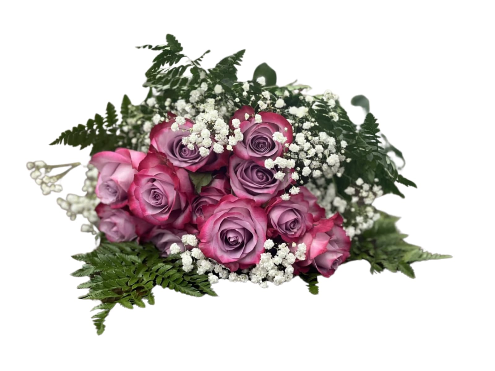 Pink and lavender roses with white baby's breath and fern foliage