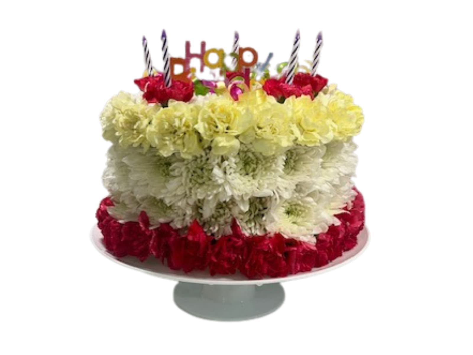 Tiered cake made of red, white, and yellow flowers with birthday candles