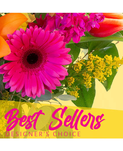 Bright mixed bouquet with pink gerbera, orange tulips, and yellow filler flowers