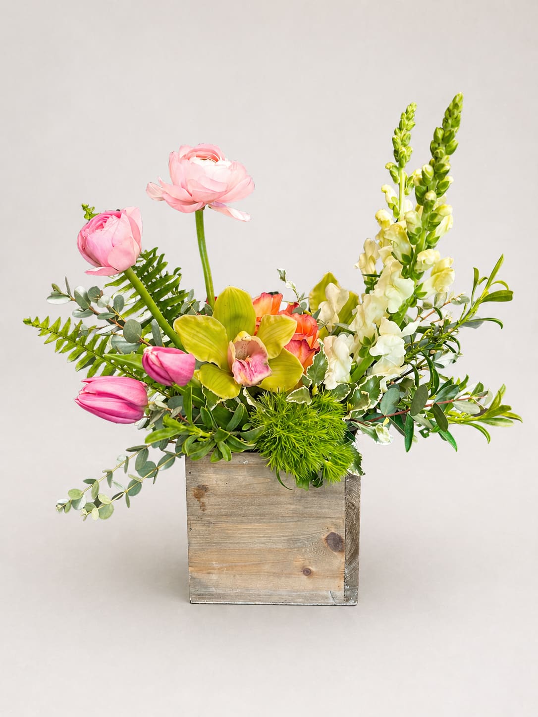 Garden Party  - A bright spring palette of pink, white, green, and yellow announces this garden-style flower arrangement-perfect as a birthday bouquet, a cheerful thank-you gift, or a just-because surprise. The loose, airy composition feels effortless and joyful, the kind of arrangement that will make the person you're thinking of feel lighthearted and genuinely seen. 