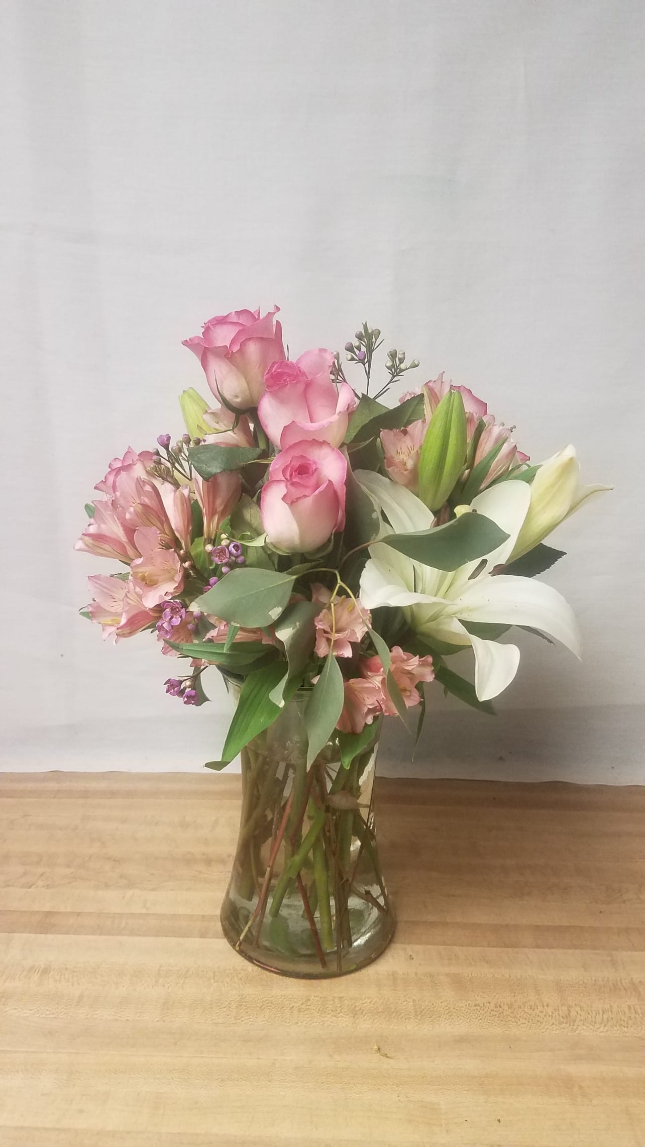 For All You Do - Perfect to let her know how much you appreciate her.  Flowers in pink and white to include roses and a lily.