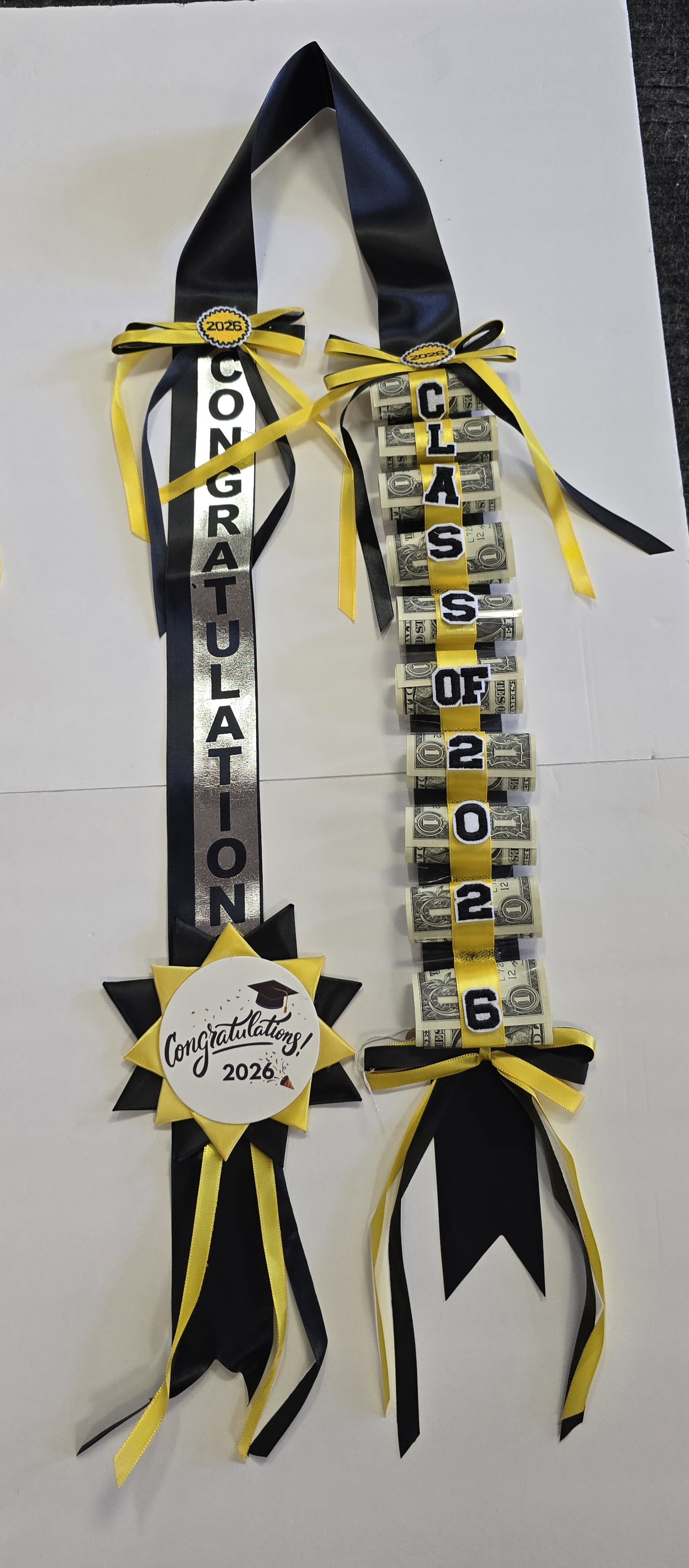 Black &amp; Yellow 2025 Money Lei #35 - (10- $1 DOLLAR BILLS ) THESE ARE REAL MONEY ON THE LEI, THERE IS NO RETURN  AND NO REFUND. ALL SALES ARE FINAL ON THESE LEI. WE HAVE MANY COLORS AVAILABLE, PLEASE CALL FOR MORE INFORMATIONS