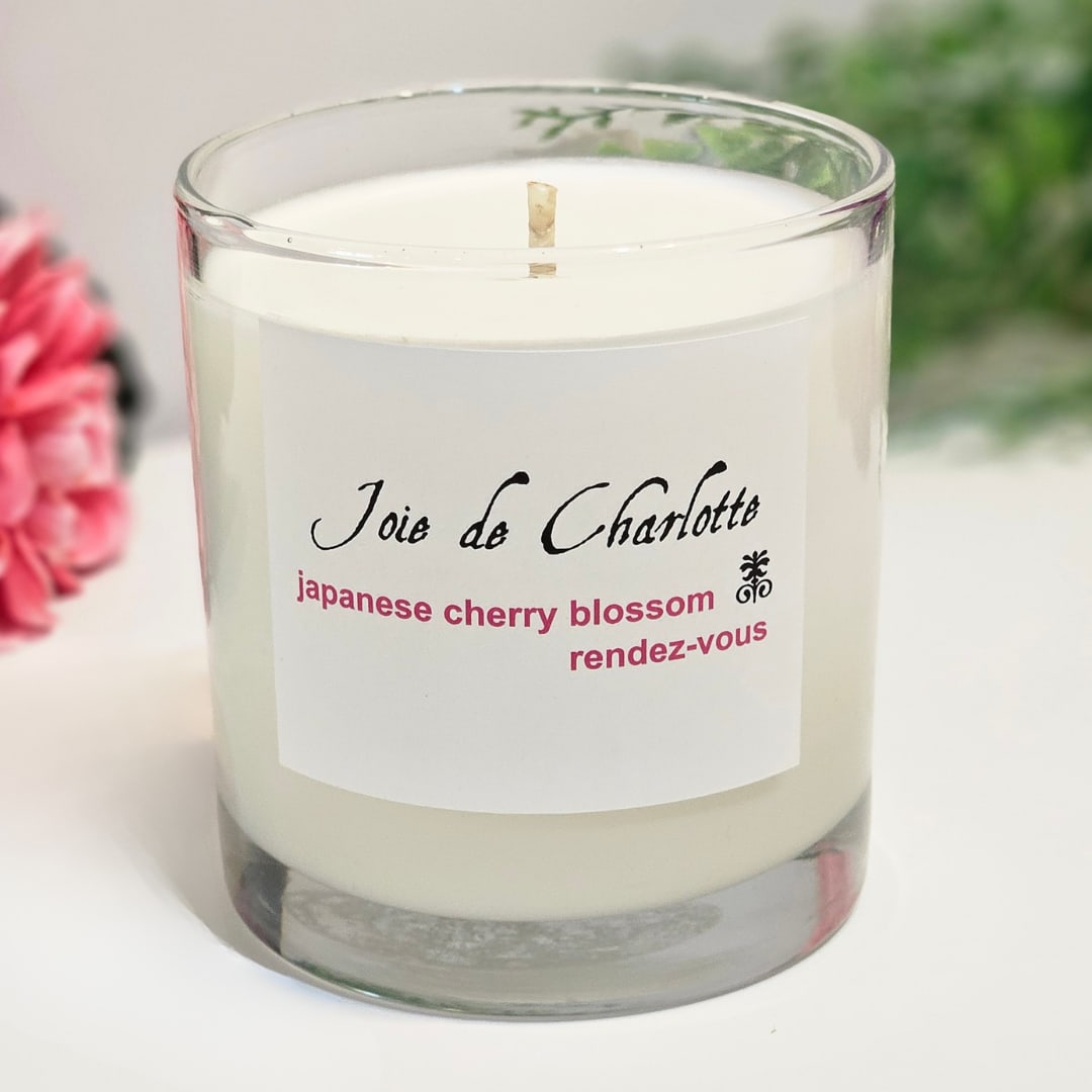 Joie de Charlotte Premium Candle, Scent - Japanese Cherry Blossom - Joie de Charlotte Candle, Scent - Japanese Cherry Blossom is a pure 100% plant based, sustainable soy, paraffin-free, hand-poured, highly fragrant candle, made in the U.S.A Net weight: 10.6 oz. Experience a cleaner &amp; longer, better quality burn.