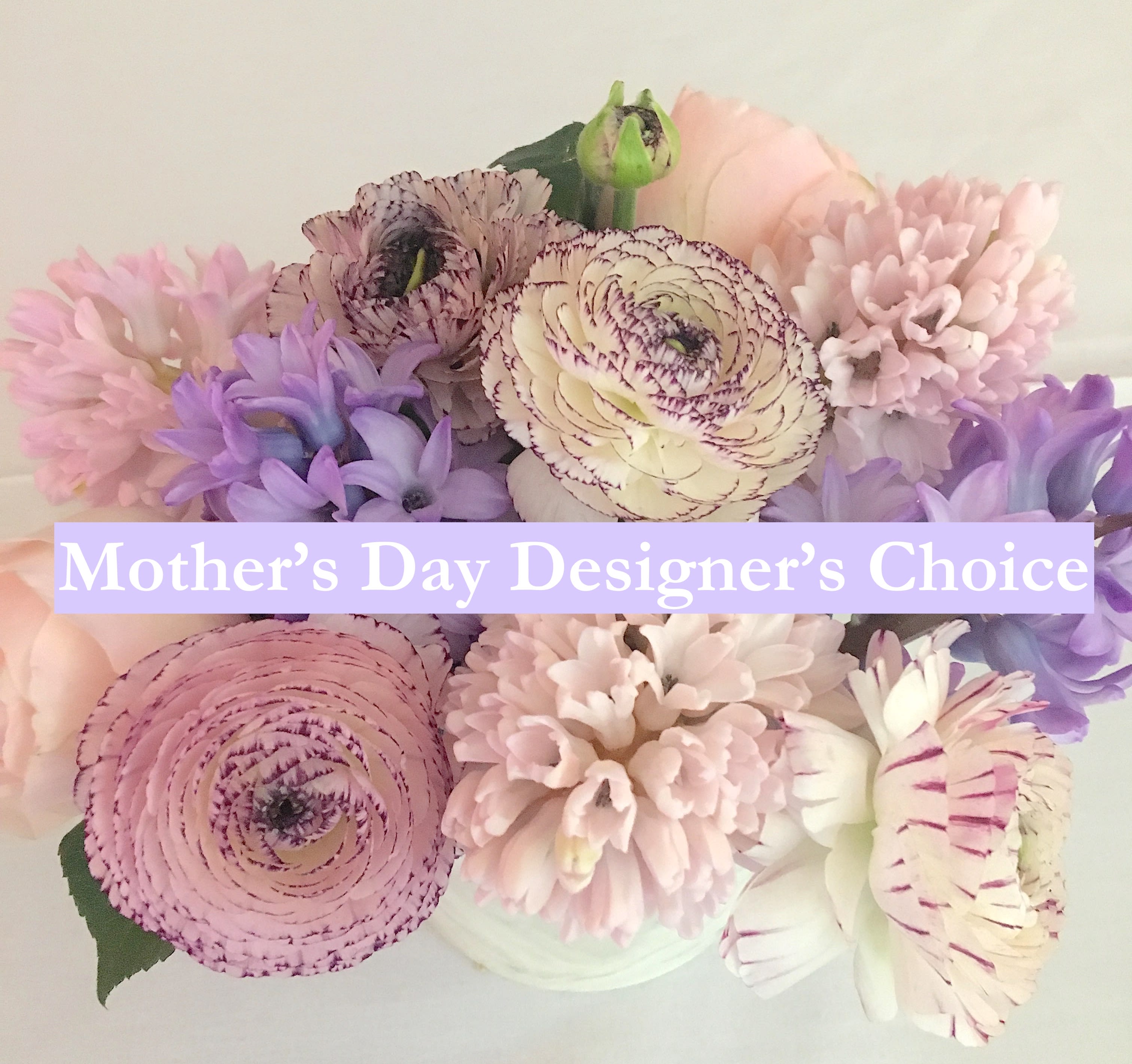 Pastel bouquet with pink, purple, and white flowers