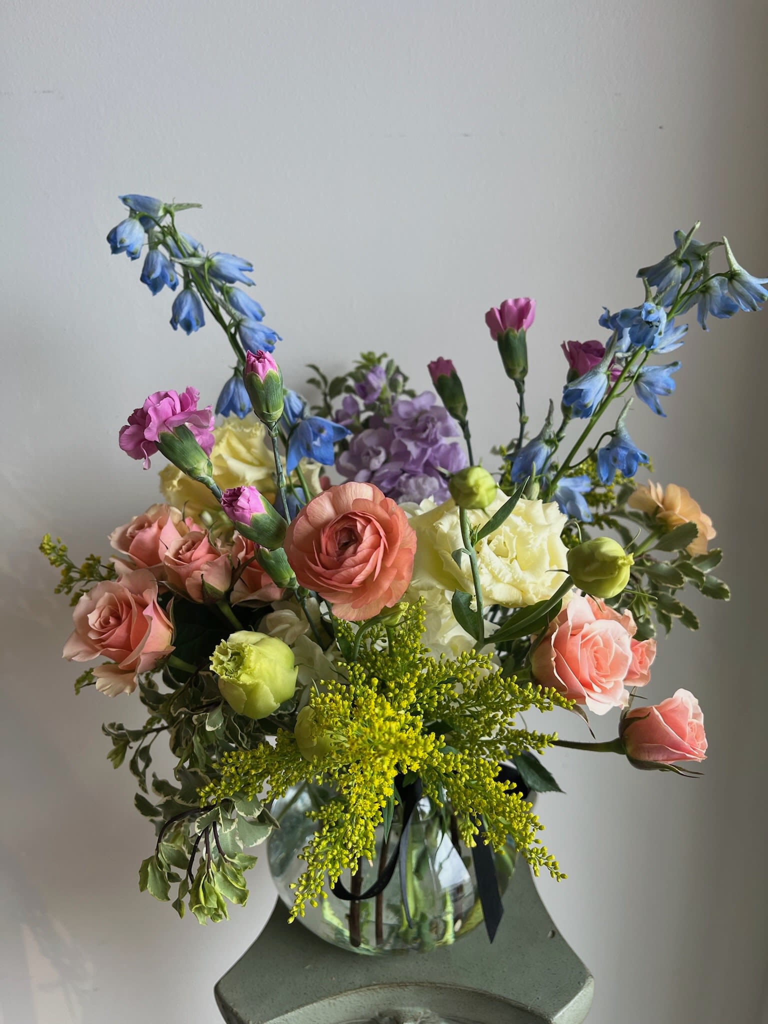 Seasonal Vase Arrangement - A beautiful vase arrangement filled with fresh seasonal flowers in the prettiest colors of the moment. Hand-designed with blooms that vary daily, making each piece one of a kind. Flowers and vases will vary according to availability.