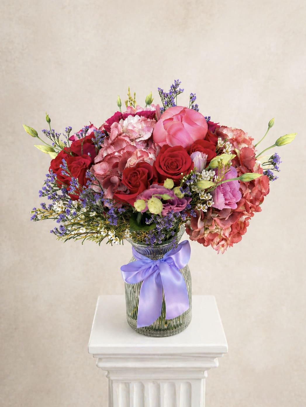 Color blossom - Brighten any space with our Elegant Flower Vase Arrangement! Bursting with vibrant blooms, this stunning display features seasonal favorites artfully arranged with lush greenery for a striking effect.  Perfect for any occasion, it makes a thoughtful gift or a lovely addition to your home decor. Elevate your surroundings with this captivating vase arrangement that brings joy and sophistication to every room.  Order yours today and let the beauty of flowers inspire you!