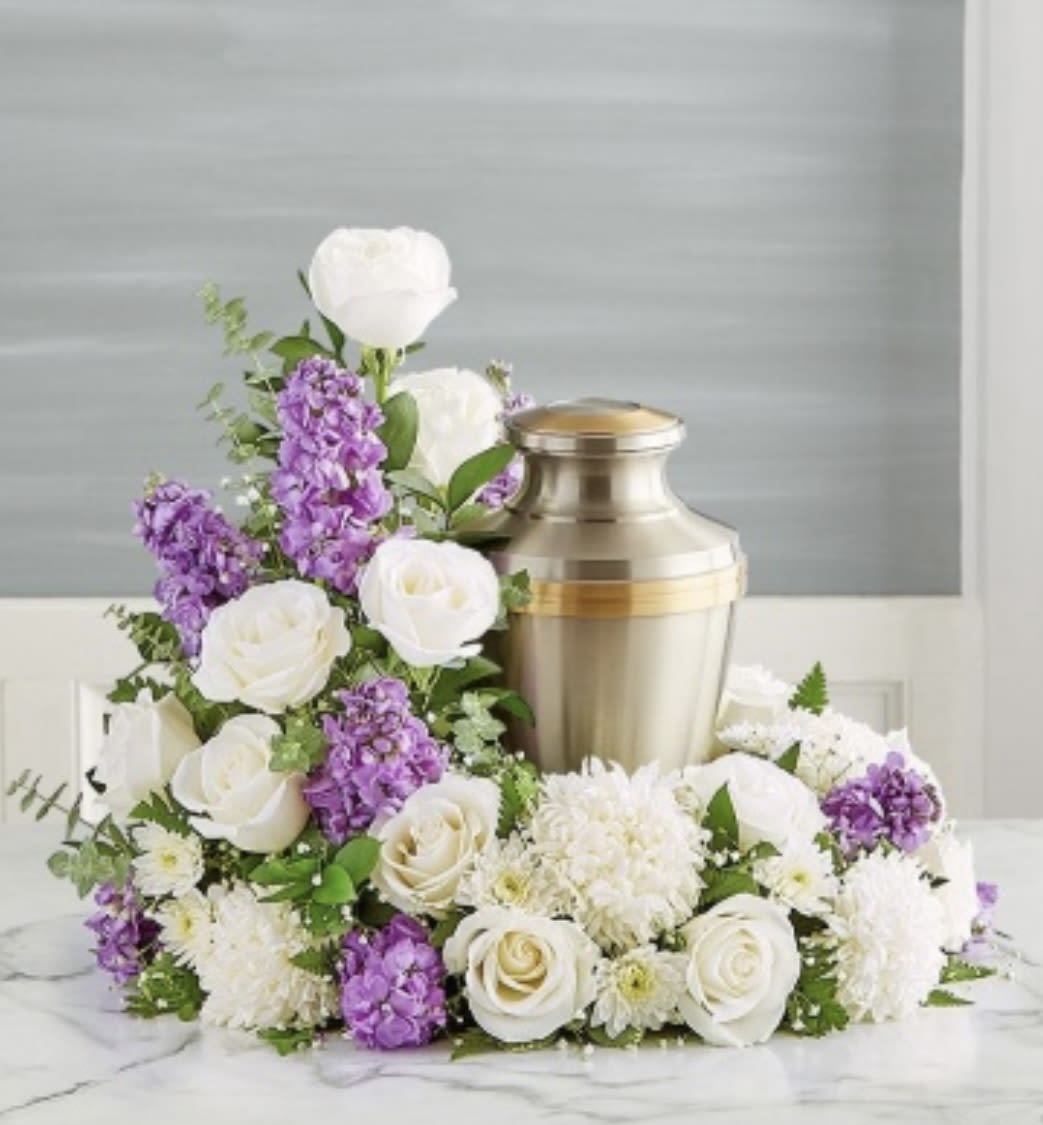 Grace of Lavender  - This arrangement has roses, chrysanthemums, Mums, stock and greenery. Urn not included. 