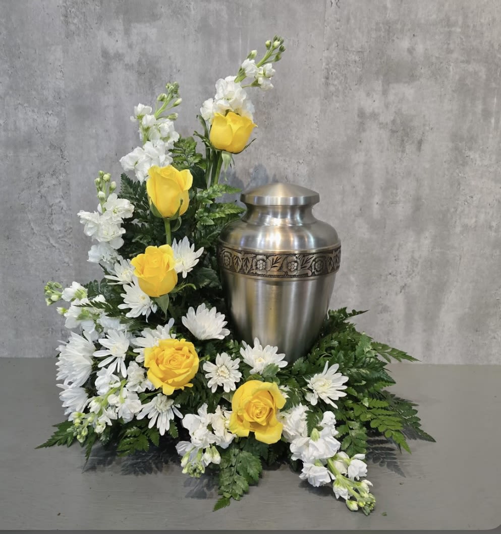 Yellow and white Tribute  - This arrangement has roses, stock, mums and greenery. Urn not included. 