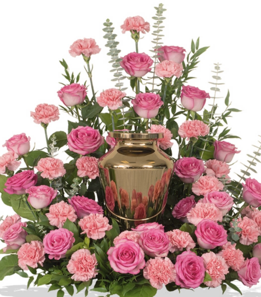 Pink Remembrance  - This arrangement has pink roses, pink carnations, spiral eucalyptus and beautiful greenery. The photo shown above is the premium. Urn not included 