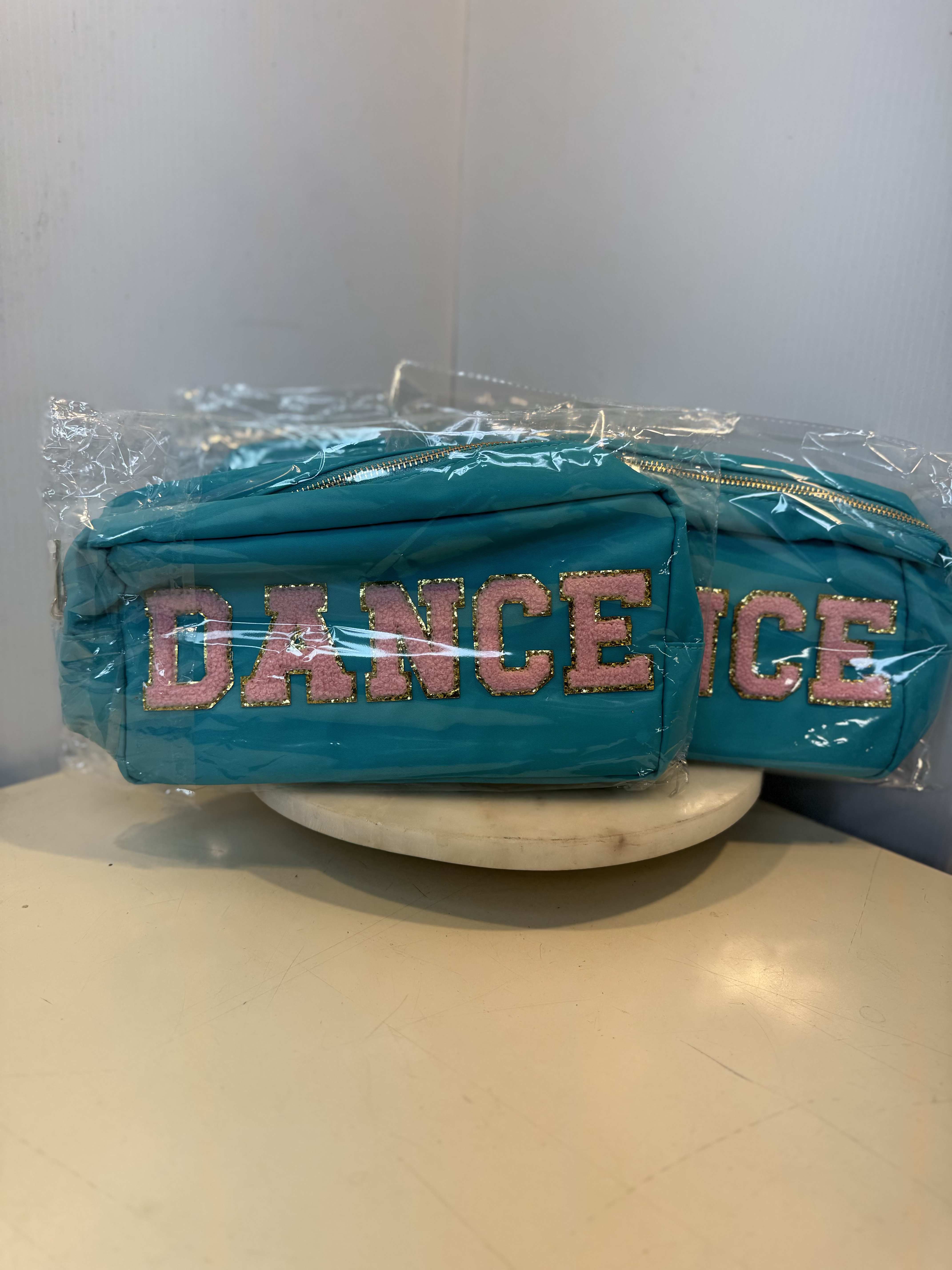 Dance Cosmetic Bag - Fun teal Dance cosmetic pouch with glitter lettering and zip closure. Perfect for recital days, makeup, hair accessories, and dance essentials. 
