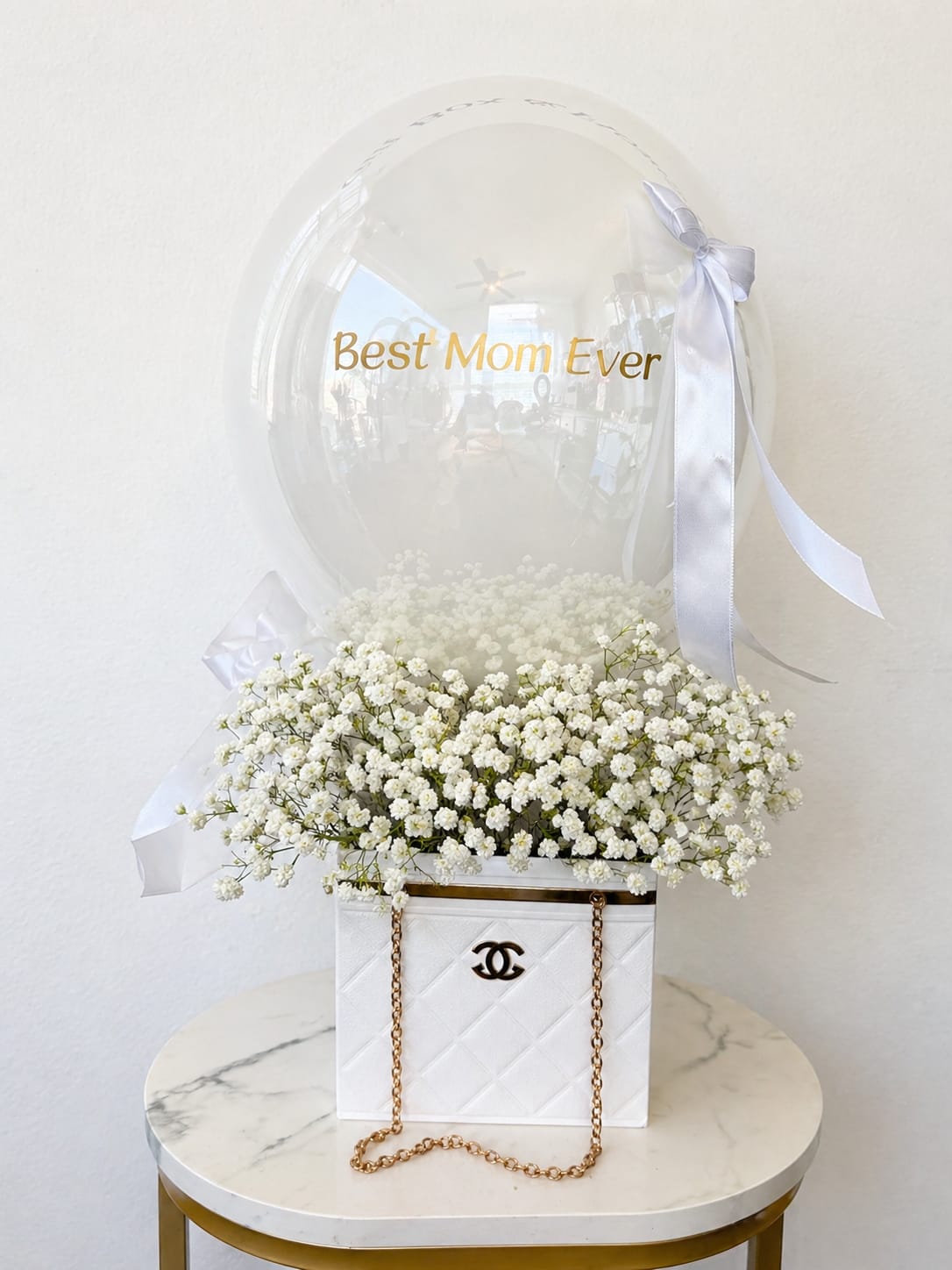Best Mom Box  - Elegant and timeless   A luxury flower box with fresh baby’s breath and a “Best Mom Ever” balloon — the perfect gift for Mother’s Day.   Handcrafted floral design  Personalized balloon  Luxury box style   Same-day delivery in Myrtle Beach (order before 12PM)