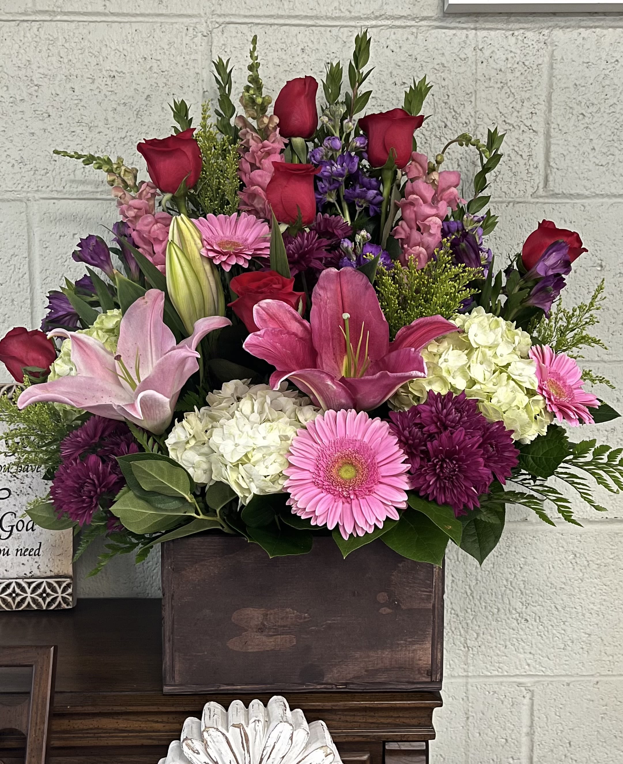 Large Wooden Garden Designers Mix  - Our popular LARGE wooden garden box with the freshest mix! This design with a modern twist will surly make anyone happy. Perfect for any occasion! Note: Designers Mix Arrangements are not specific. Our colorful mix arrangements are DESIGNERS CHOICE. Meaning the flower WILL be different from photo showed and the colors as well. Each box is to their own. In the special instructions box let us know the occasion and we’ll try our best to accommodate. Guarantee a beautiful arrangement