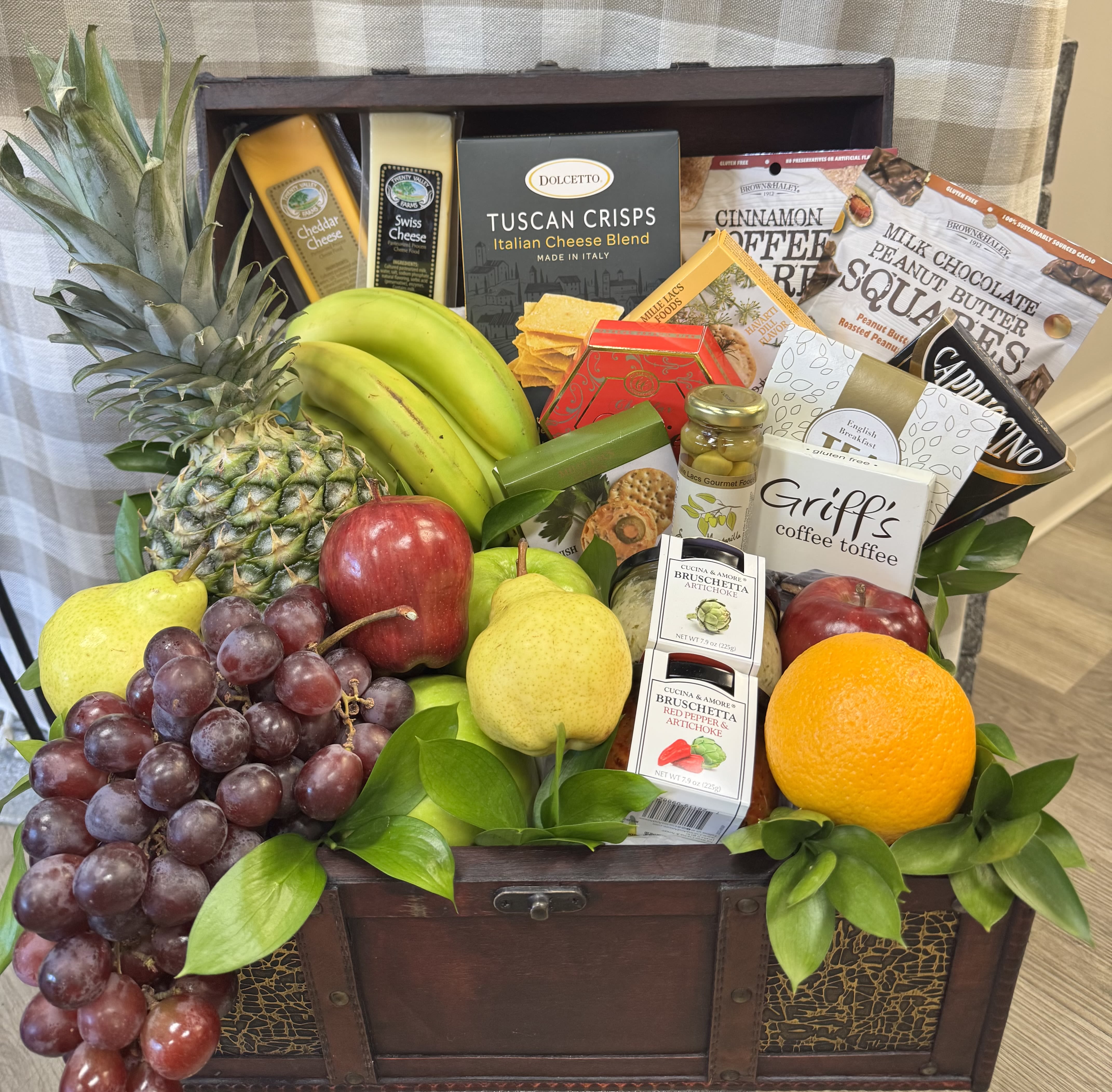 Tuscan Harvest Delight - A beautifully arranged gift crate featuring fresh seasonal fruit, artisan cheeses, gourmet crackers, sweet treats, and savory spreads—perfect for sharing or indulging.